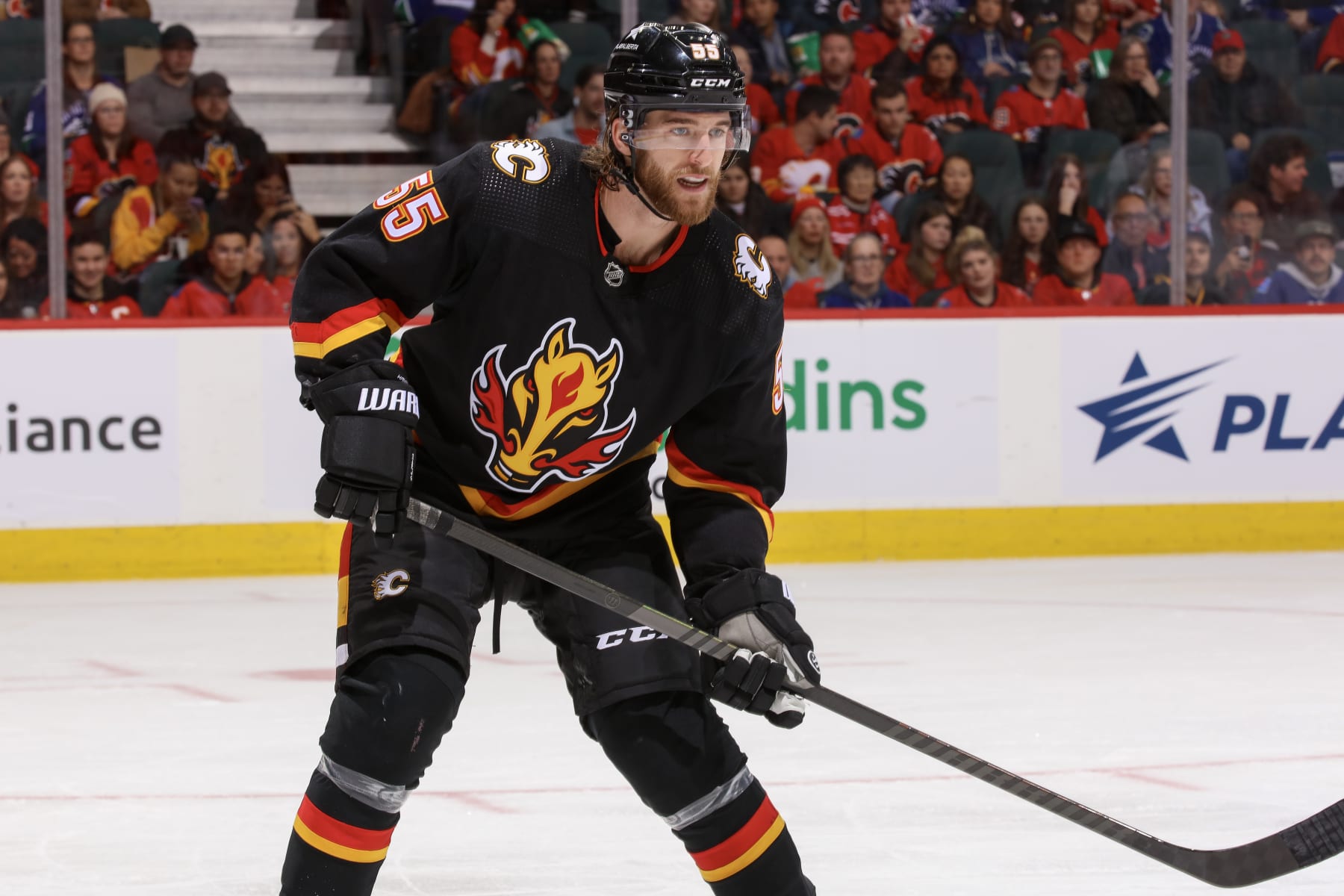 CALGARY, ALBERTA - DECEMBER 02: Noah Hanifin #55 of the Calgary Flames skates against the Vancouver Canucks at the Scotiabank Saddledome on December 02, 2023 in Calgary, Alberta. (Photo by Gerry Thomas/NHLI via Getty Images)