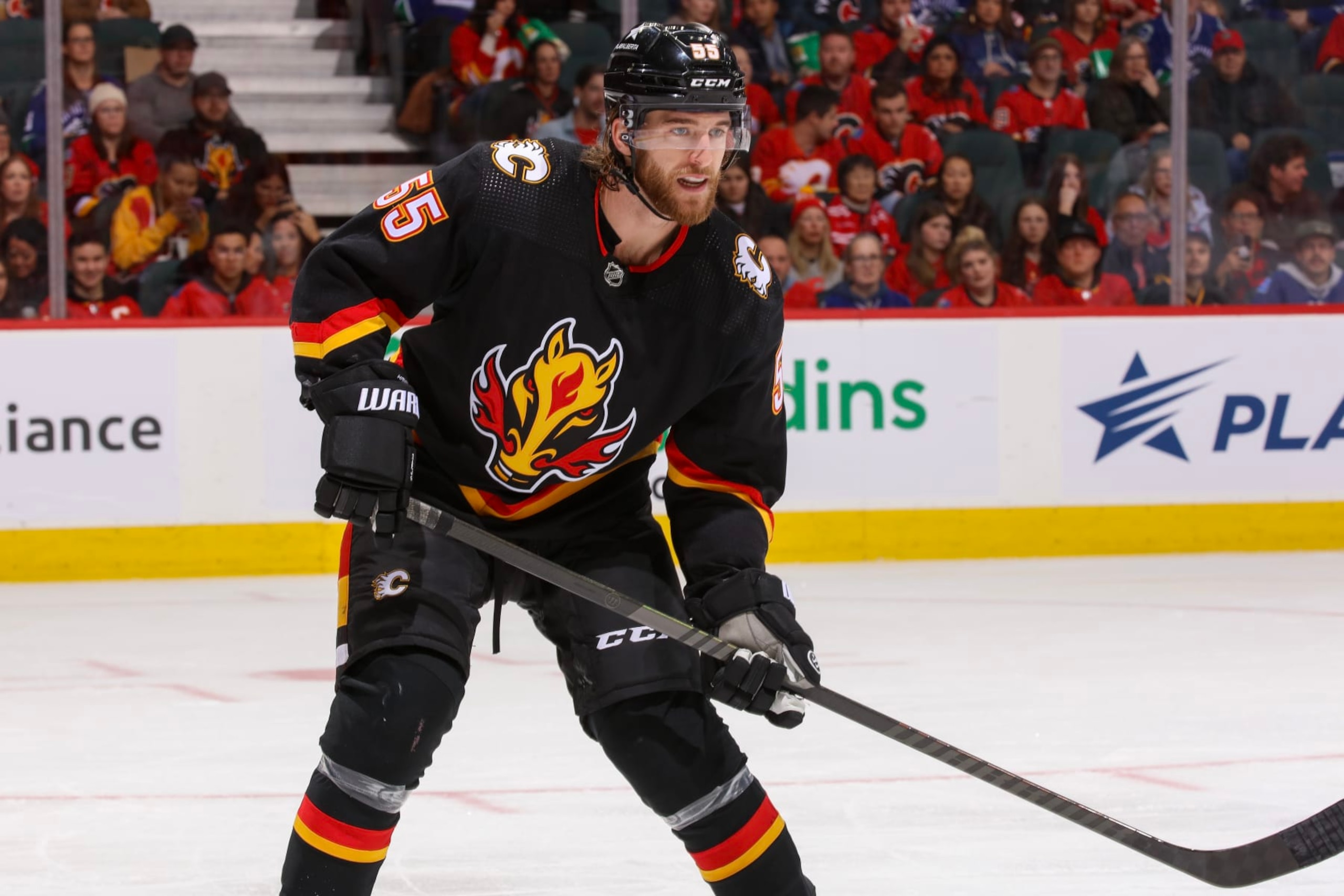 CALGARY, ALBERTA - DECEMBER 02: Noah Hanifin #55 of the Calgary Flames skates against the Vancouver Canucks at the Scotiabank Saddledome on December 02, 2023 in Calgary, Alberta. (Photo by Gerry Thomas/NHLI via Getty Images) CALGARY, ALBERTA - DECEMBER 02: Noah Hanifin #55 of the Calgary Flames skates against the Vancouver Canucks at the Scotiabank Saddledome on December 02, 2023 in Calgary, Alberta. (Photo by Gerry Thomas/NHLI via Getty Images)