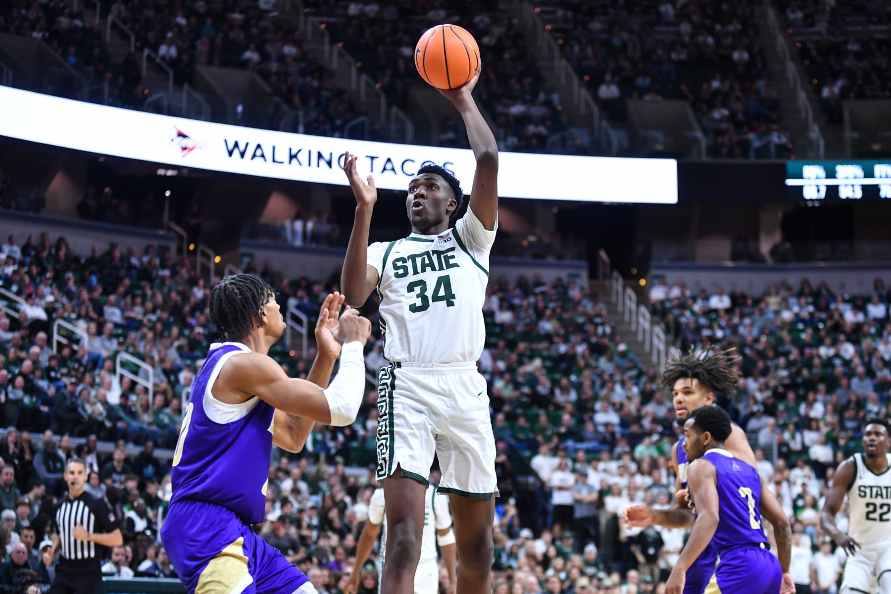EAST LANSING, MI - NOVEMBER 19: Michigan State Spartans forward Xavier Booker (34) shoots a jump hook during a college basketball game between the Michigan State Spartans and Alcorn State Braves on November 19, 2023 at the Breslin Center in East Lansing, MI. (Photo by Adam Ruff/Icon Sportswire via Getty Images)