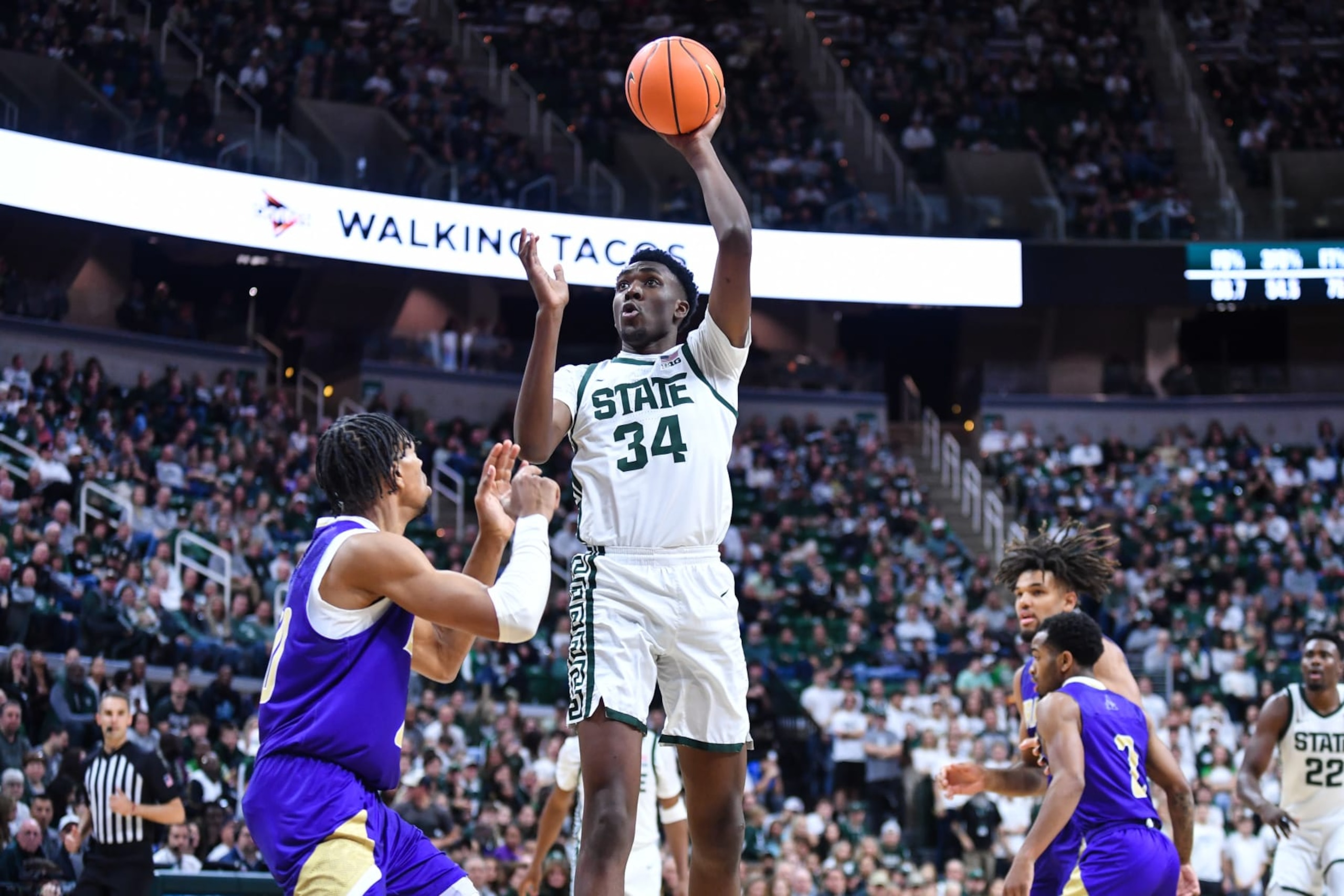 EAST LANSING, MI - NOVEMBER 19: Michigan State Spartans forward Xavier Booker (34) shoots a jump hook during a college basketball game between the Michigan State Spartans and Alcorn State Braves on November 19, 2023 at the Breslin Center in East Lansing, MI. (Photo by Adam Ruff/Icon Sportswire via Getty Images)