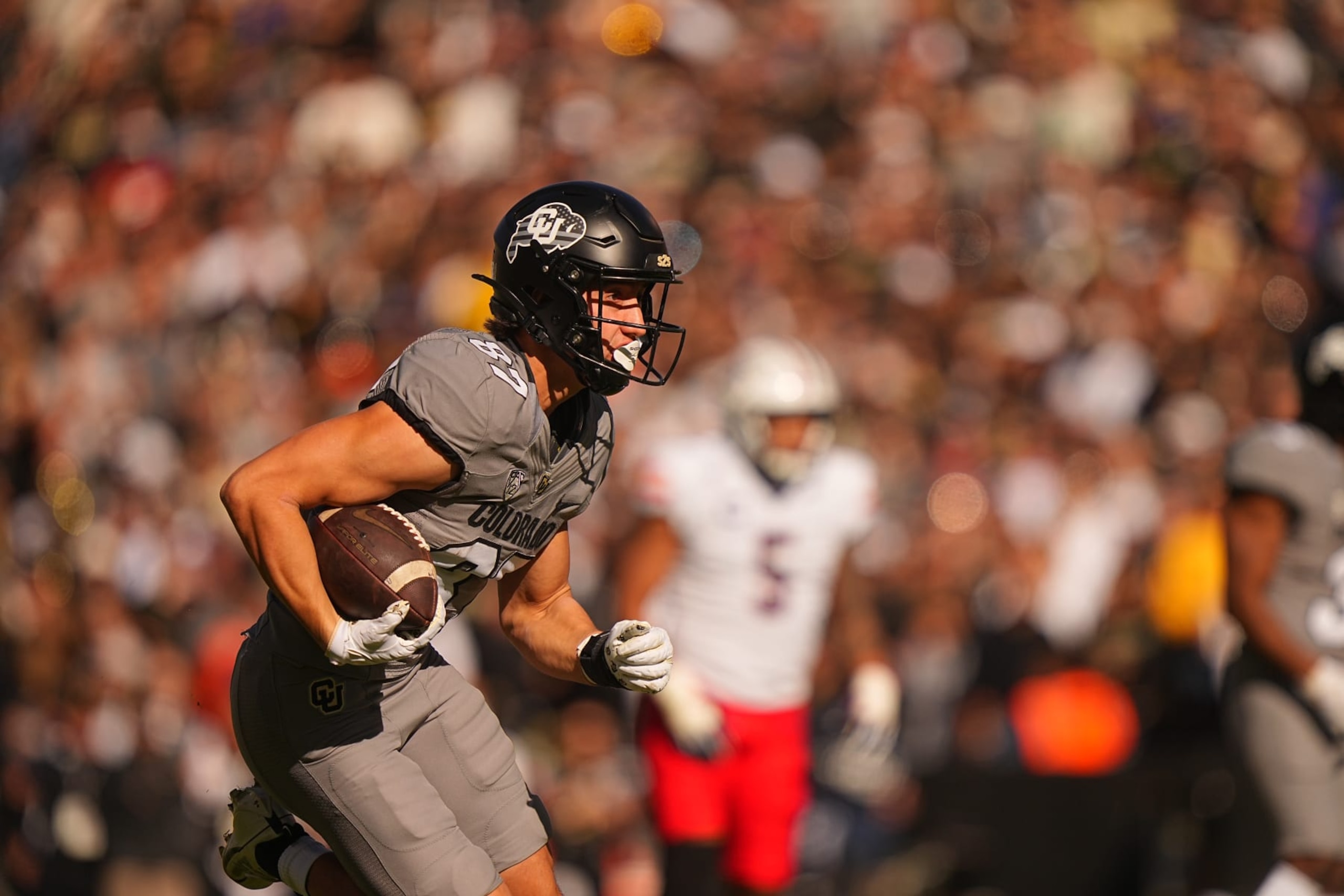 College Football: Colorado Michael Harrison (87) in action, runs with the football vs Arizona at Folsom Field. 
Boulder, CO 11/11/2023 
CREDIT: Erick W. Rasco (Photo by Erick W. Rasco/Sports Illustrated via Getty Images) 
(Set Number: X164462)