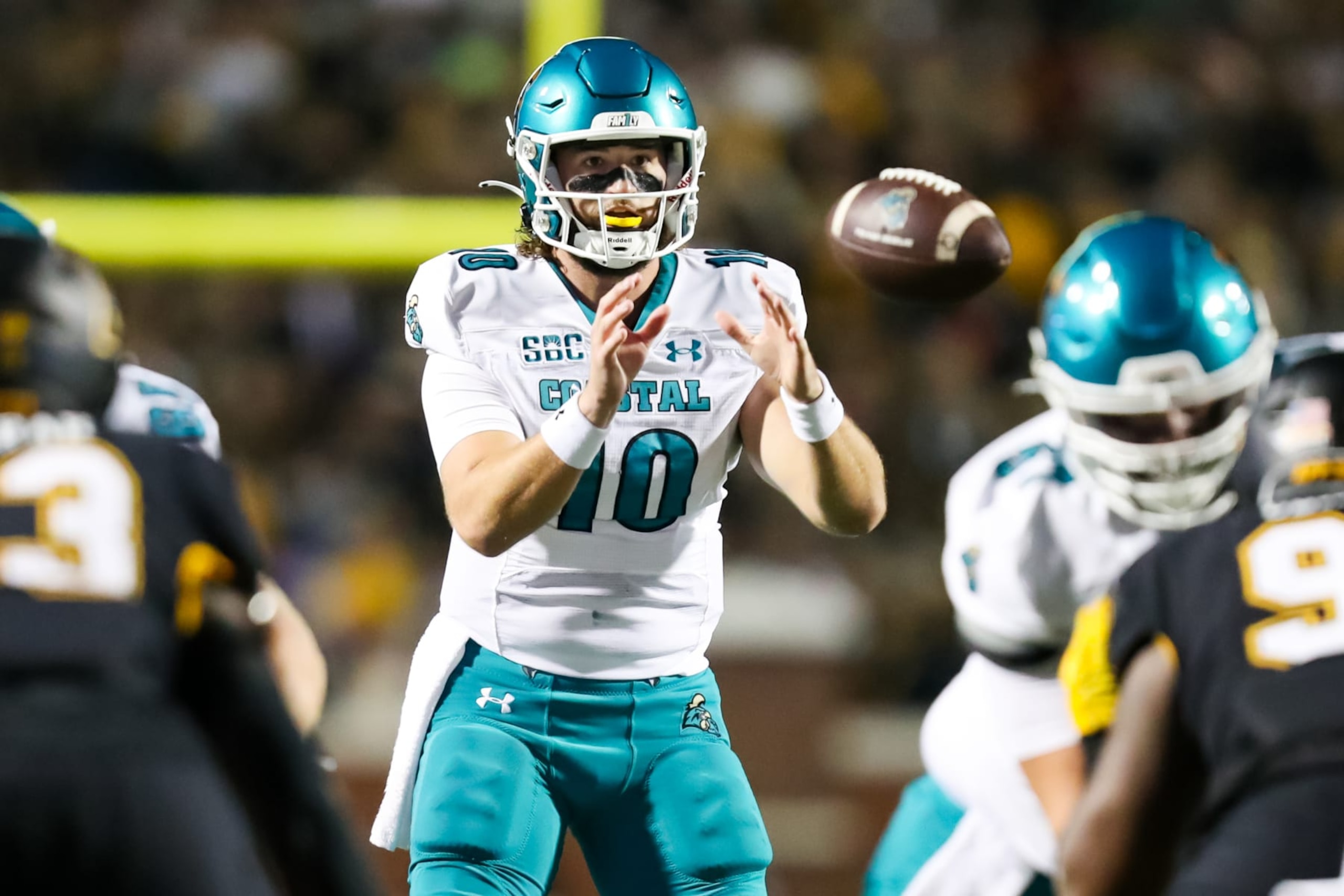 BOONE, NC - OCTOBER 10: Grayson McCall #10 of the Coastal Carolina Chanticleers snaps the ball during a football game against the Appalachian State Mountaineers at Kidd Brewer Stadium in Boone, North Carolina on Oct 10, 2023. (Photo by David Jensen/Icon Sportswire via Getty Images)
