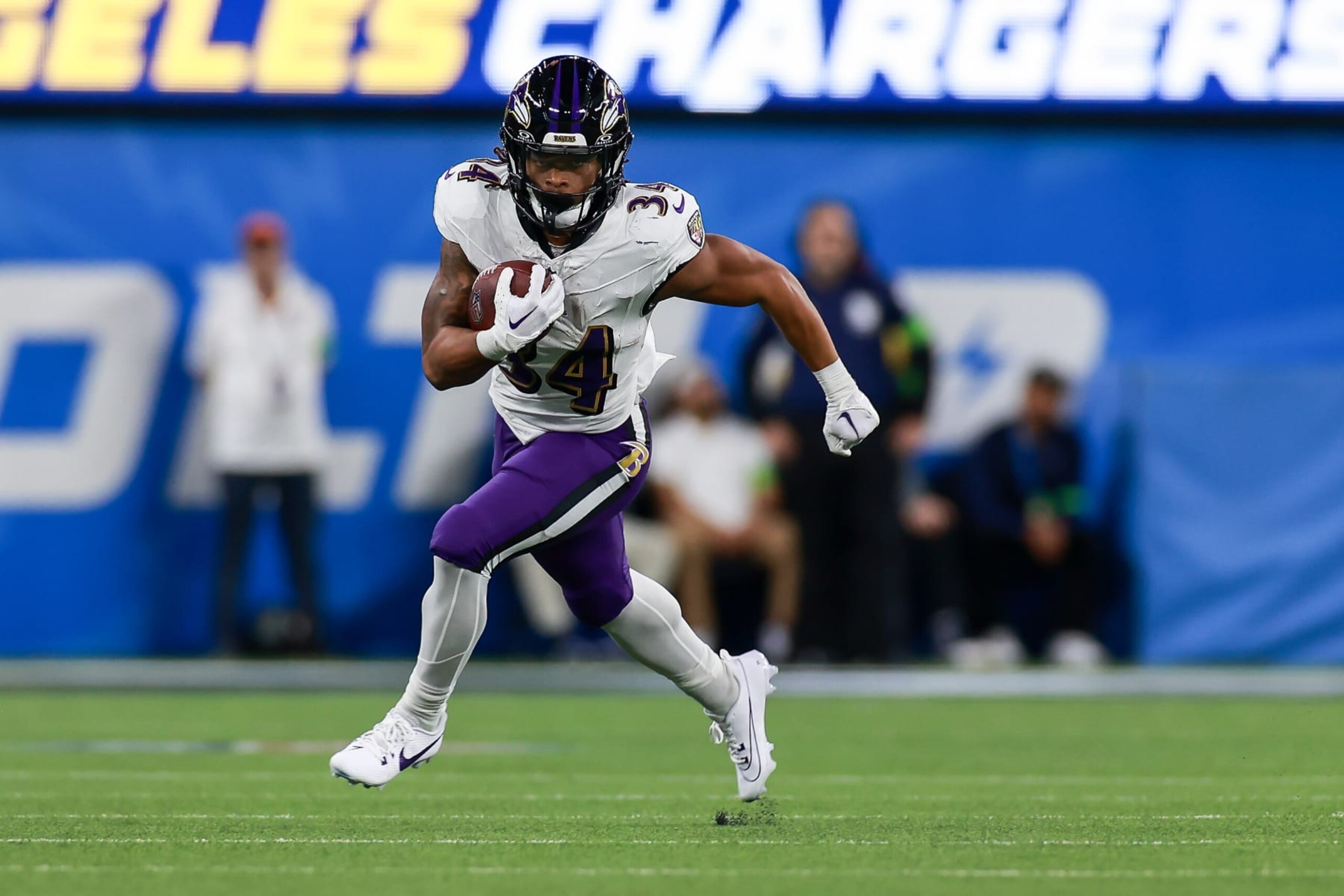 INGLEWOOD, CA - NOVEMBER 26: Baltimore Ravens running back Keaton Mitchell (34) gets loose during the Baltimore Ravens game versus the Los Angeles Chargers at Sofi Stadium in Inglewood, CA. (Photo by Jevone Moore/Icon Sportswire via Getty Images)