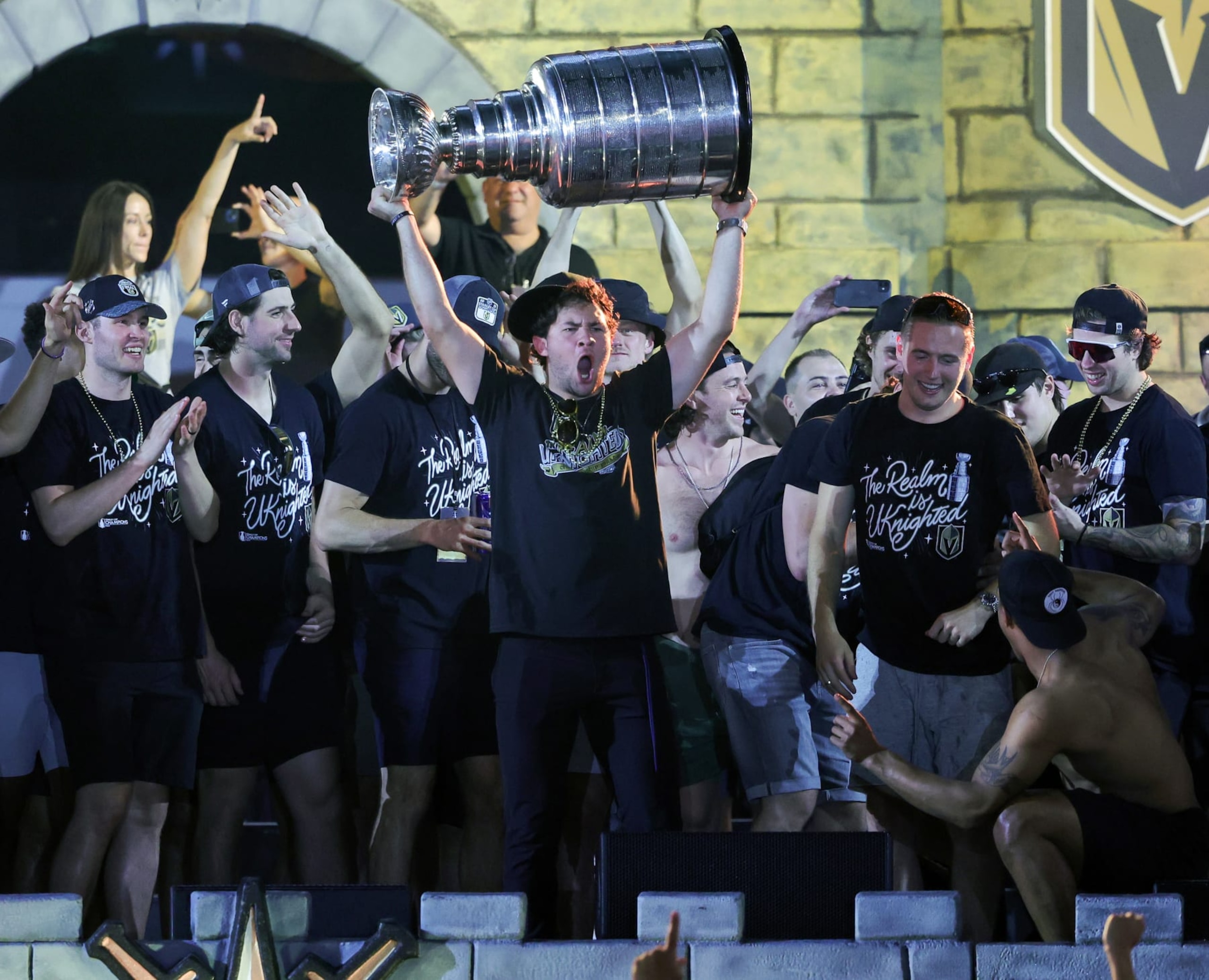 LAS VEGAS, NEVADA - JUNE 17: (L-R) Brayden McNabb #3, Nicolas Hague #14, Paul Cotter (hoisting the Stanley Cup) #43, Jonathan Marchessault #81, Ivan Barbashev #49, Keegan Kolesar #55 and Ben Hutton #17 of the Vegas Golden Knights celebrate onstage during a victory parade and rally for the Golden Knights outside T-Mobile Arena on June 17, 2023 in Las Vegas, Nevada. The Golden Knights defeated the Florida Panthers four games to one to win the 2023 NHL Stanley Cup Final. (Photo by Ethan Miller/Getty Images) LAS VEGAS, NEVADA - JUNE 17: (L-R) Brayden McNabb #3, Nicolas Hague #14, Paul Cotter (hoisting the Stanley Cup) #43, Jonathan Marchessault #81, Ivan Barbashev #49, Keegan Kolesar #55 and Ben Hutton #17 of the Vegas Golden Knights celebrate onstage during a victory parade and rally for the Golden Knights outside T-Mobile Arena on June 17, 2023 in Las Vegas, Nevada. The Golden Knights defeated the Florida Panthers four games to one to win the 2023 NHL Stanley Cup Final. (Photo by Ethan Miller/Getty Images)
