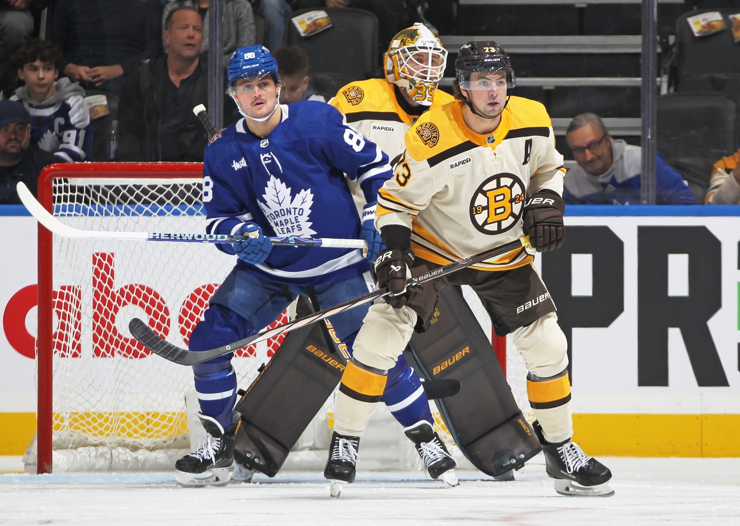 TORONTO, CANADA - DECEMBER 2:  Charlie McAvoy #73 of the Boston Bruins defends against William Nylander #88 of the Toronto Maple Leafs during the first period in an NHL game at Scotiabank Arena on December 2, 2023 in Toronto, Ontario, Canada. The Bruins defeated the Maple Leafs 4-3 in overtime. (Photo by Claus Andersen/Getty Images)
