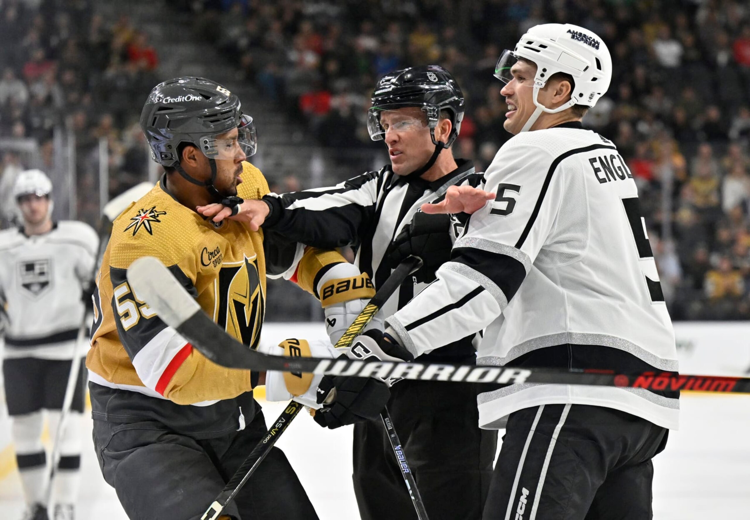 LAS VEGAS, NEVADA - NOVEMBER 08: Keegan Kolesar #55 of the Vegas Golden Knights fights with Andreas Englund #5 of the Los Angeles Kings during the third period at T-Mobile Arena on November 08, 2023 in Las Vegas, Nevada. (Photo by David Becker/NHLI via Getty Images)