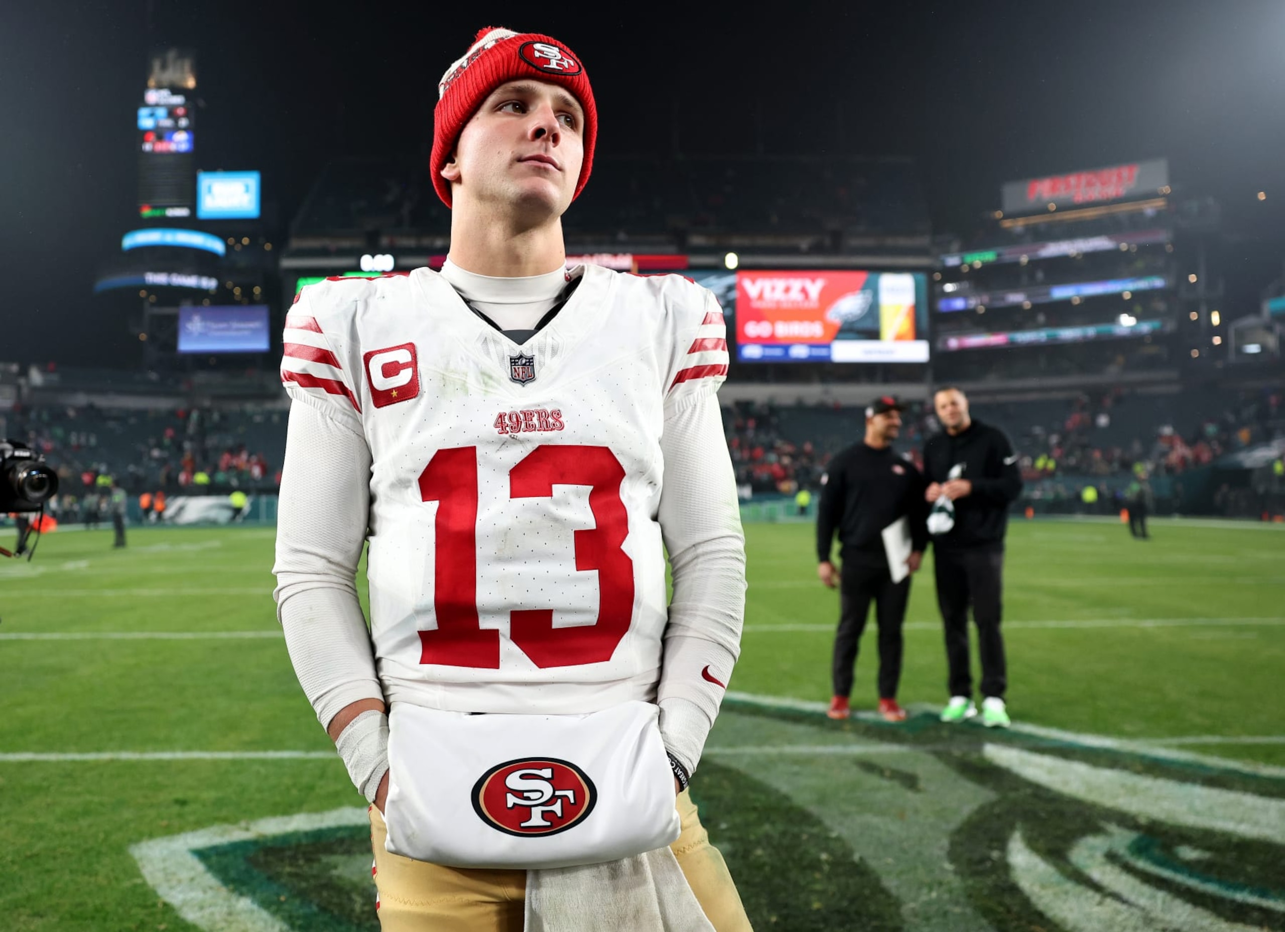 PHILADELPHIA, PENNSYLVANIA - DECEMBER 03: Brock Purdy #13 of the San Francisco 49ers walks on the field after a win over the Philadelphia Eagles at Lincoln Financial Field on December 03, 2023 in Philadelphia, Pennsylvania. (Photo by Tim Nwachukwu/Getty Images)