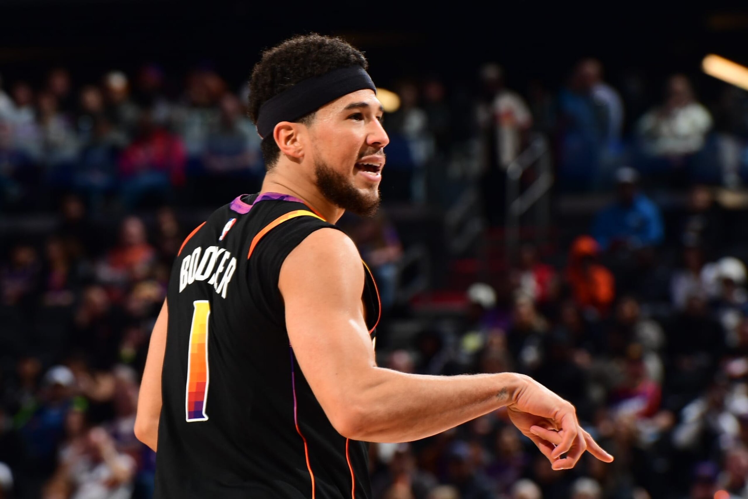 PHOENIX, AZ - DECEMBER 2: Devin Booker #1 of the Phoenix Suns looks on during the game against the Memphis Grizzlies on December 2, 2023 at Footprint Center in Phoenix, Arizona. NOTE TO USER: User expressly acknowledges and agrees that, by downloading and or using this photograph, user is consenting to the terms and conditions of the Getty Images License Agreement. Mandatory Copyright Notice: Copyright 2023 NBAE (Photo by Kate Frese/NBAE via Getty Images)