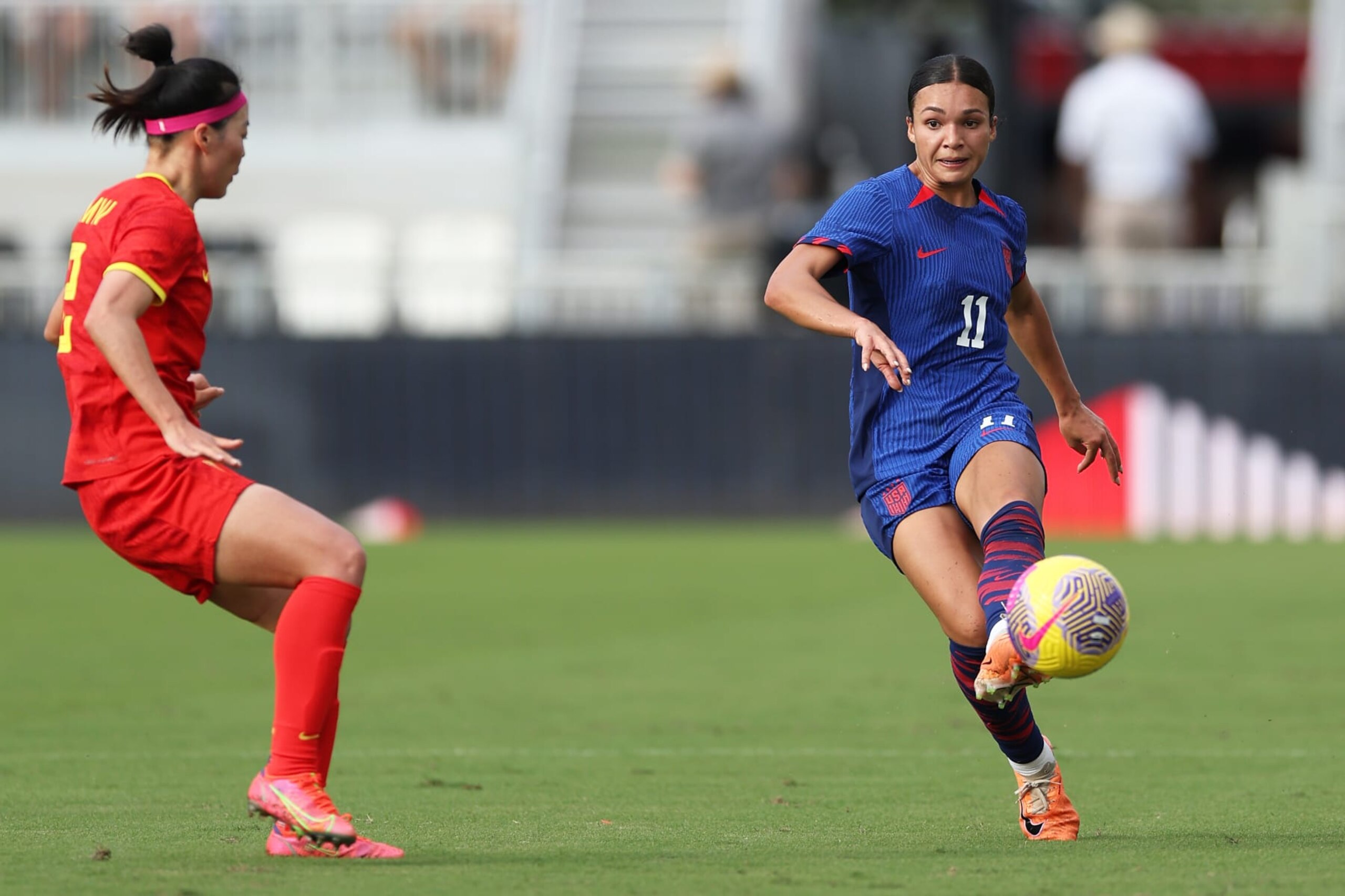 FORT LAUDERDALE, FLORIDA - DECEMBER 02: Sophia Smith #11 of the United States  passes the ball during the first half of an international friendly against China PR at DRV PNK Stadium on December 02, 2023 in Fort Lauderdale, Florida. (Photo by Brennan Asplen/USSF/Getty Images for USSF)