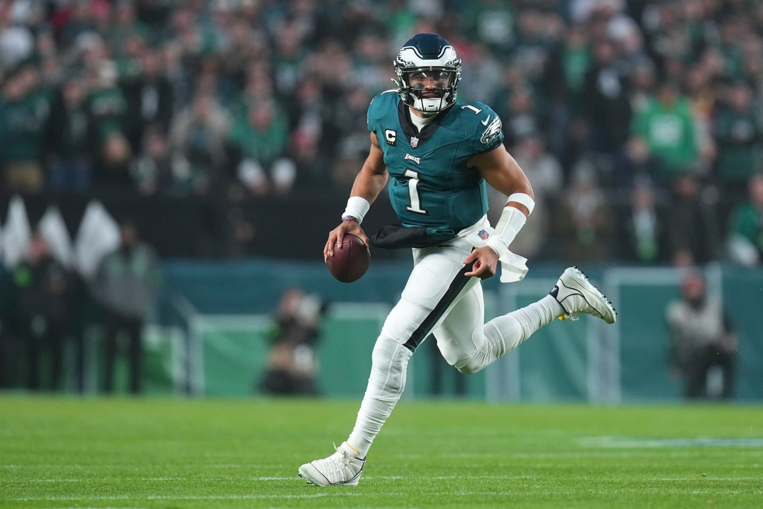 PHILADELPHIA, PENNSYLVANIA - DECEMBER 3: Jalen Hurts #1 of the Philadelphia Eagles scrambles against the San Francisco 49ers at Lincoln Financial Field on December 3, 2023 in Philadelphia, Pennsylvania. (Photo by Mitchell Leff/Getty Images)