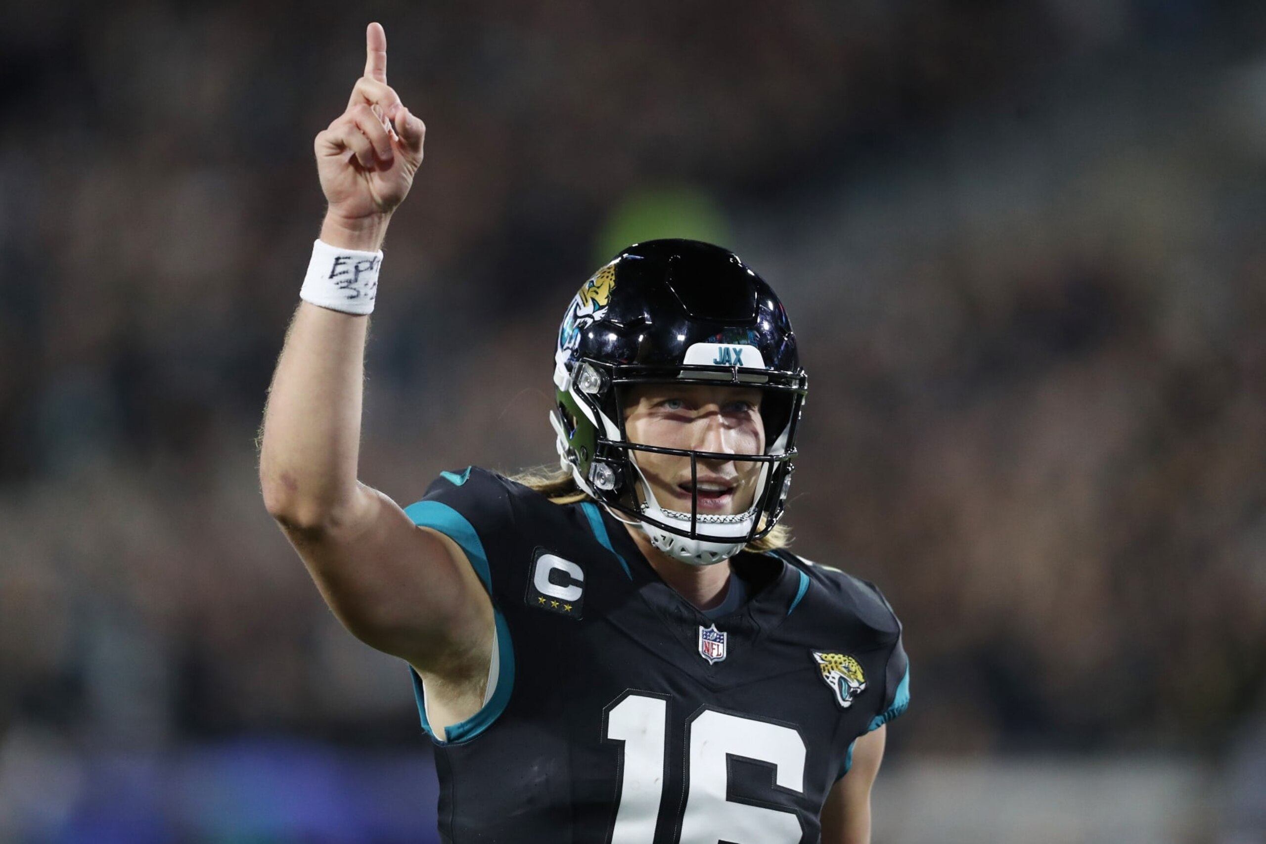 JACKSONVILLE, FLORIDA - DECEMBER 04: Trevor Lawrence #16 of the Jacksonville Jaguars celebrates a touchdown run by Travis Etienne Jr. #1 (not pictured) during the first quarter at EverBank Stadium on December 04, 2023 in Jacksonville, Florida. (Photo by Courtney Culbreath/Getty Images)