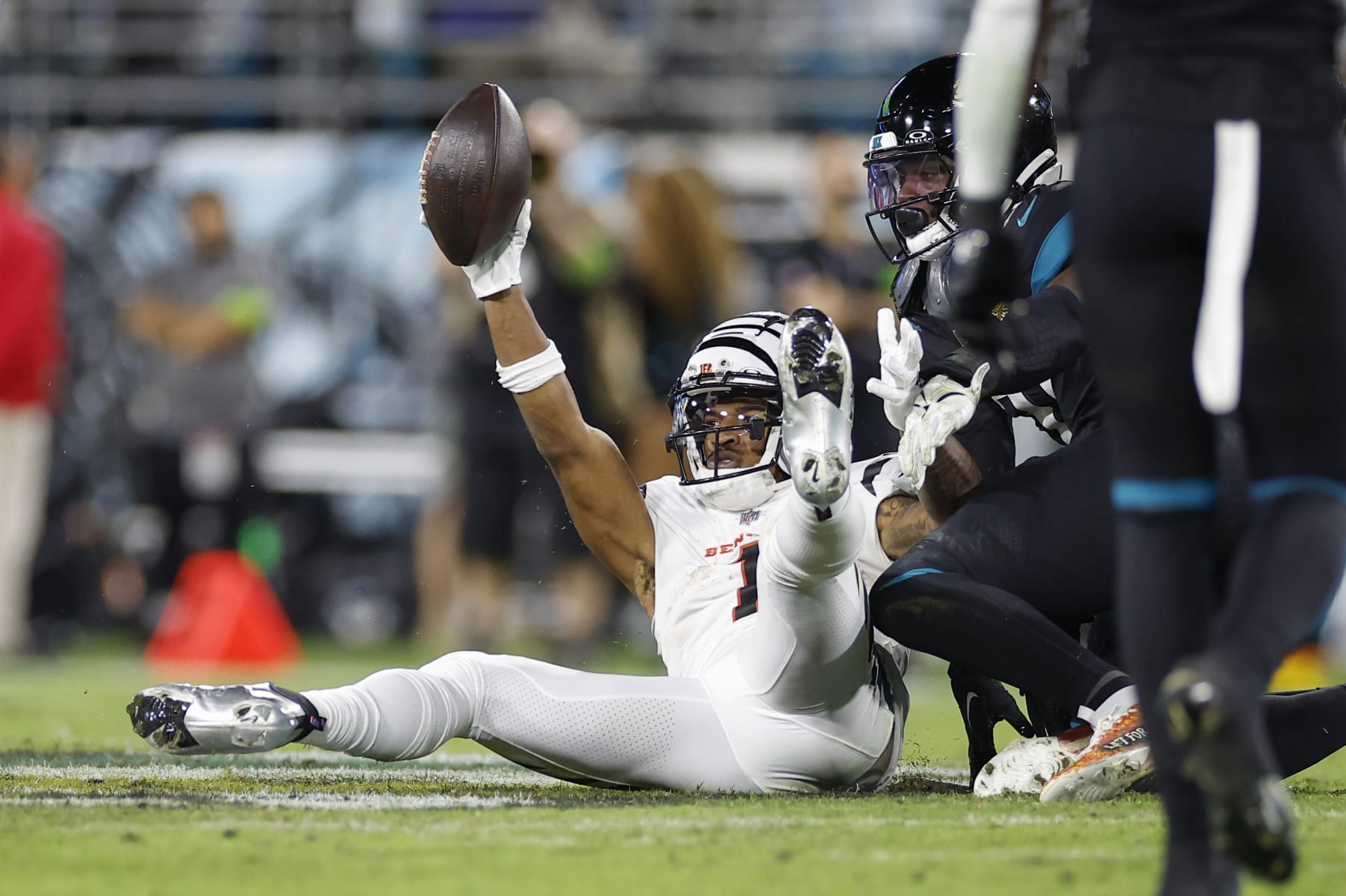 JACKSONVILLE, FL - DECEMBER 04: Cincinnati Bengals wide receiver Ja'Marr Chase (1) reacts after a play during the game between the Jacksonville Jaguars and the Cincinnati Bengals on December 4, 2023 at EverBank Stadium in Jacksonville, Fl. (Photo by David Rosenblum/Icon Sportswire via Getty Images)
