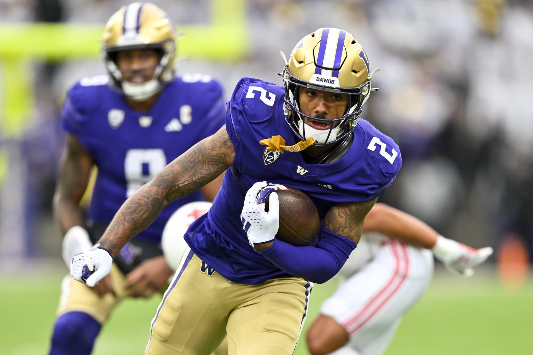 SEATTLE, WASHINGTON - NOVEMBER 11: Ja'Lynn Polk #2 of the Washington Huskies in action during the fourth quarter against the Utah Utes at Husky Stadium on November 11, 2023 in Seattle, Washington. The Washington Huskies won 35-28. (Photo by Alika Jenner/Getty Images)