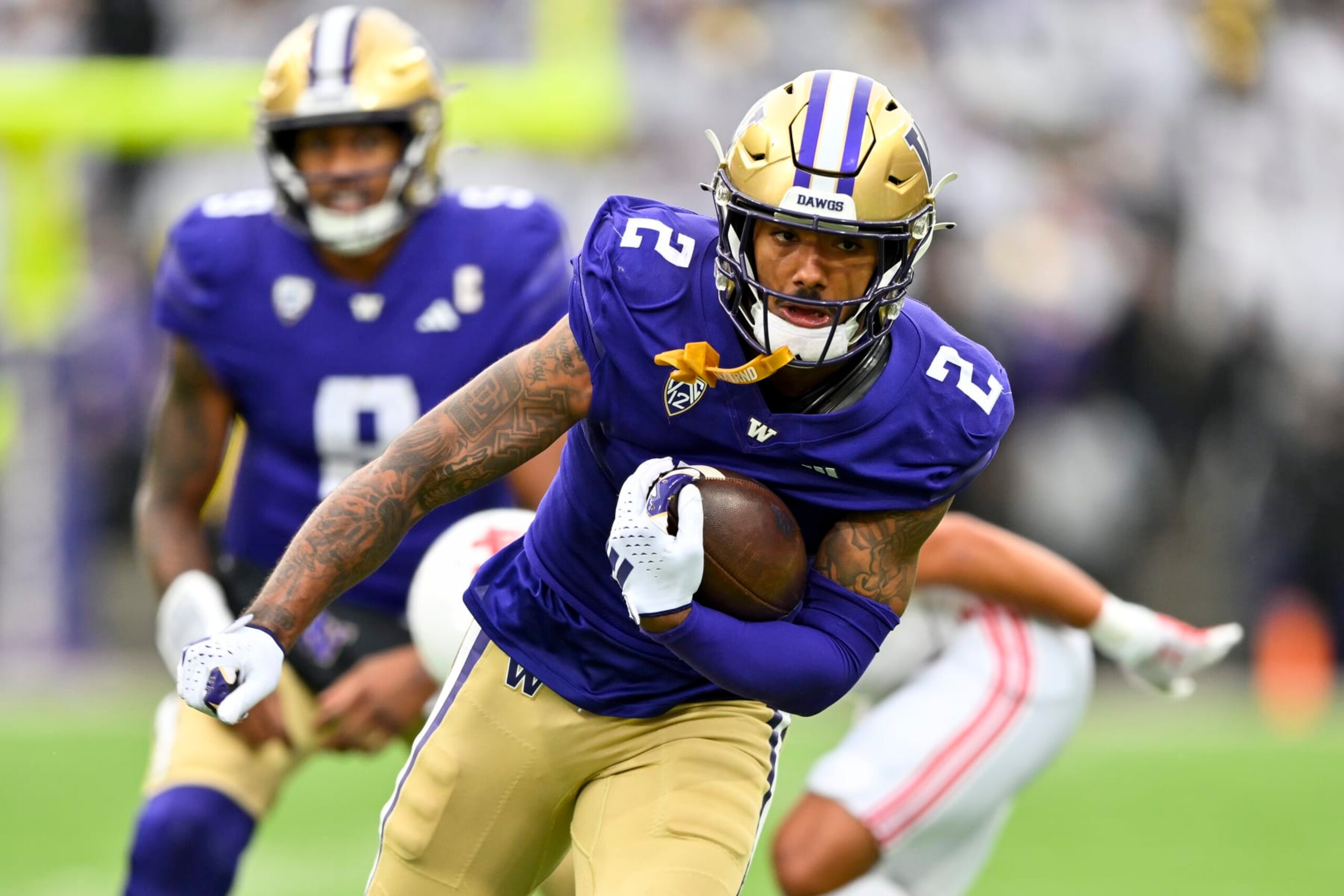 SEATTLE, WASHINGTON - NOVEMBER 11: Ja'Lynn Polk #2 of the Washington Huskies in action during the fourth quarter against the Utah Utes at Husky Stadium on November 11, 2023 in Seattle, Washington. The Washington Huskies won 35-28. (Photo by Alika Jenner/Getty Images)