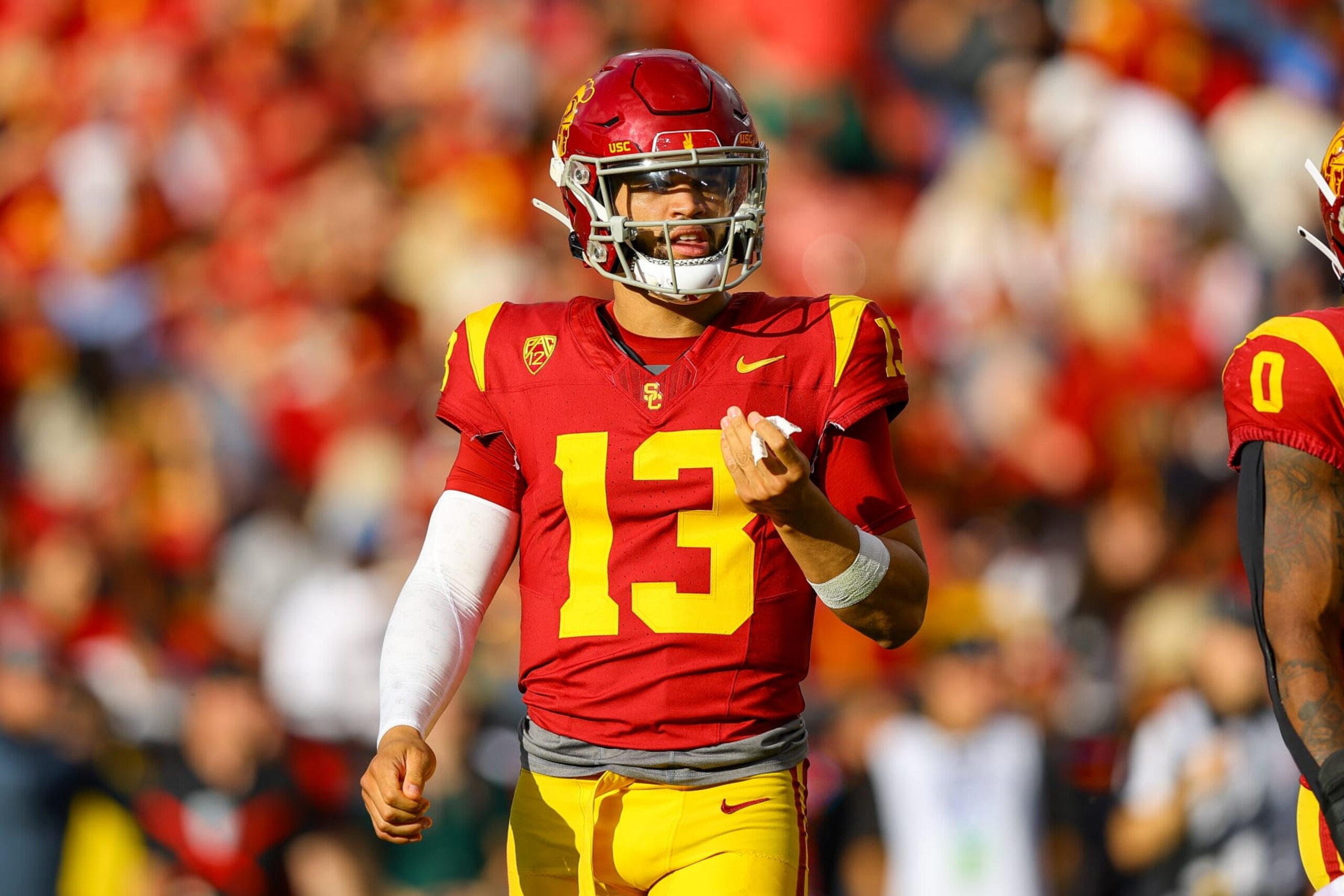 LOS ANGELES, CA - NOVEMBER 18: USC Trojans quarterback Caleb Williams (13) walks onto the field during a college football game between the UCLA Bruins and the USC Trojans on November 18, 2023, at the Los Angeles Memorial Coliseum in Los Angeles, CA. (Photo by Jordon Kelly/Icon Sportswire via Getty Images) LOS ANGELES, CA - NOVEMBER 18: USC Trojans quarterback Caleb Williams (13) walks onto the field during a college football game between the UCLA Bruins and the USC Trojans on November 18, 2023, at the Los Angeles Memorial Coliseum in Los Angeles, CA. (Photo by Jordon Kelly/Icon Sportswire via Getty Images)