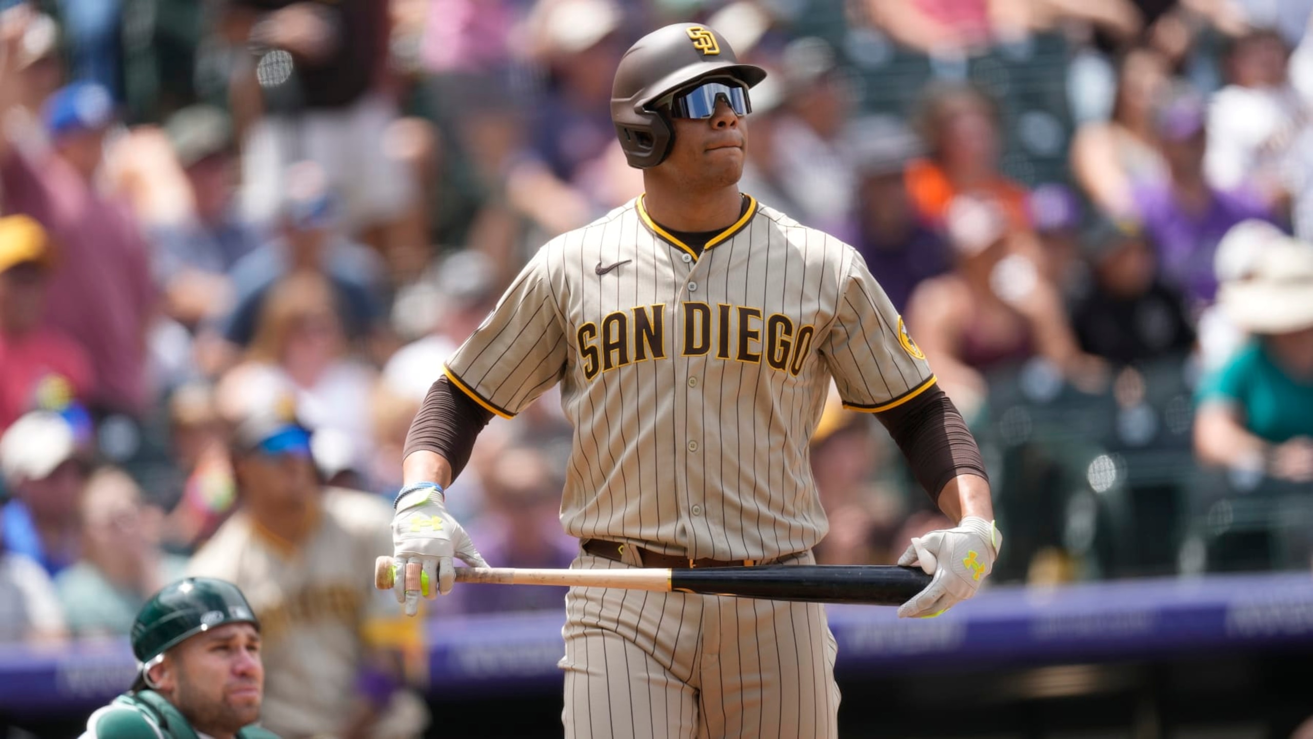 San Diego Padres left fielder Juan Soto (22) in the third inning of a baseball game Wednesday, Aug. 2, 2023, in Denver. (AP Photo/David Zalubowski)
