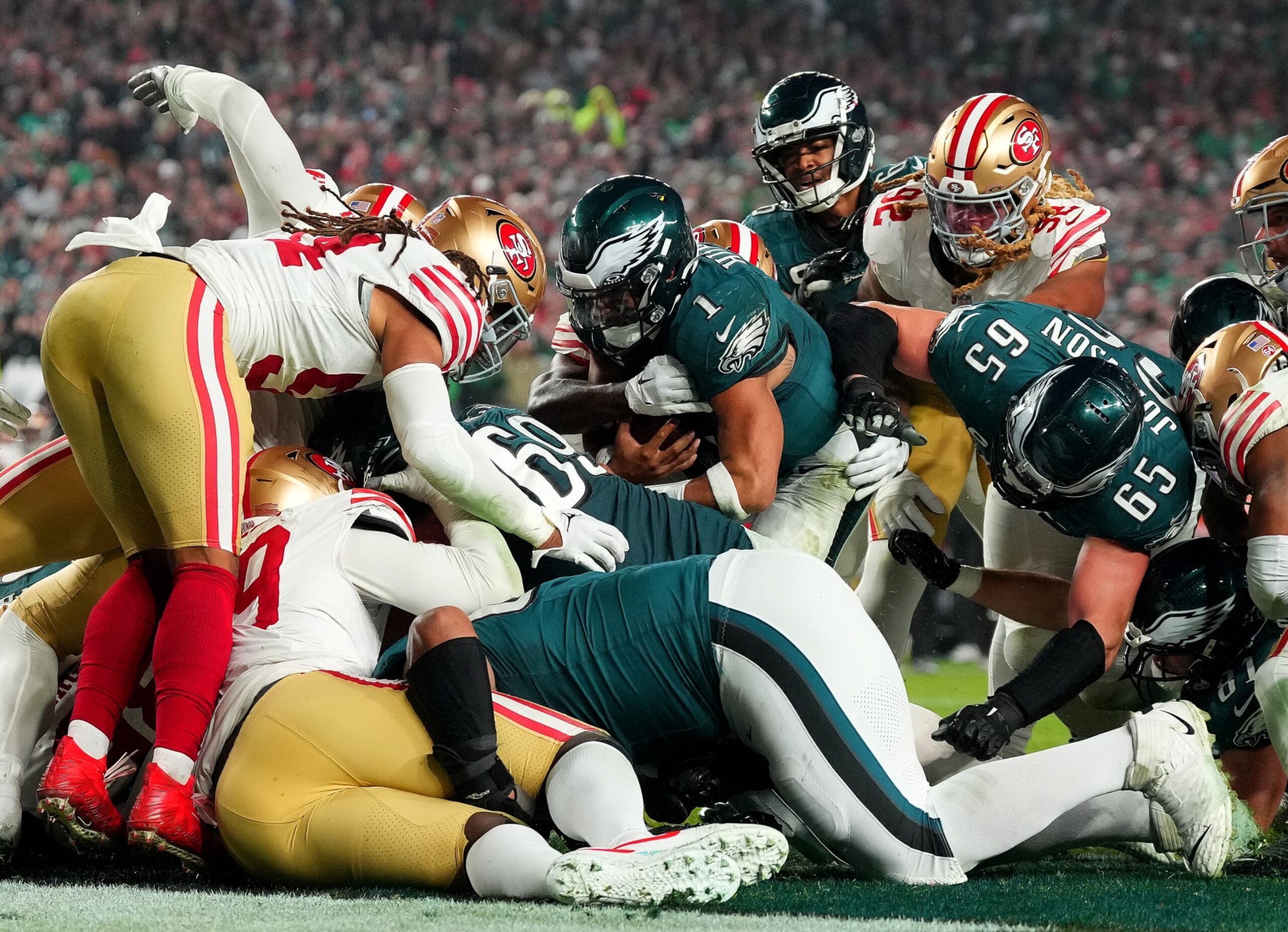 Eagles QB Jalen Hurts scores a touchdown against the 49ers in Week 13.
