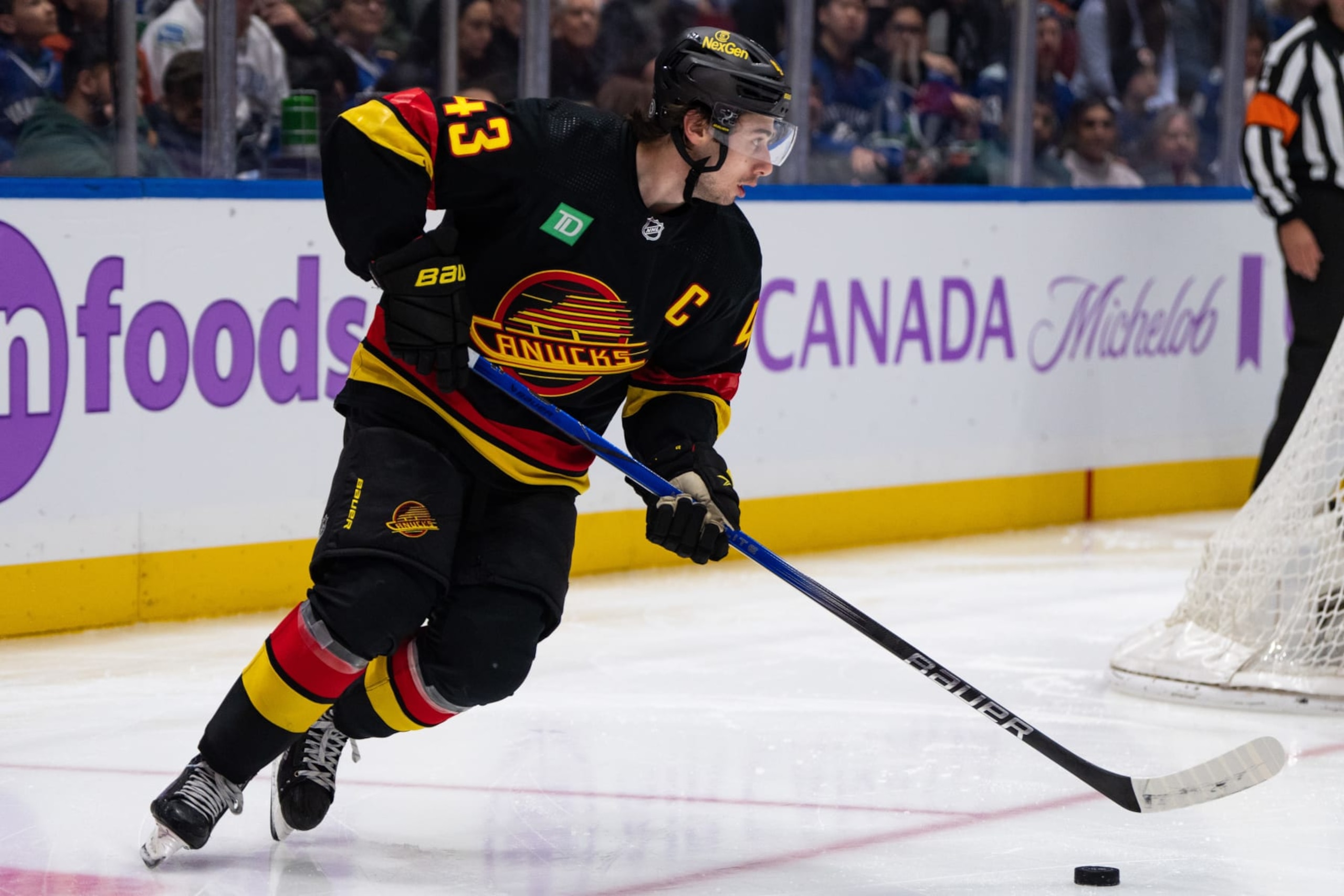 VANCOUVER, BC - NOVEMBER 28: Vancouver Canucks defenseman Quinn Hughes (43) skates with the puck during a Vancouver Canucks game against the Anaheim Ducks on November 28, 2023, at Rogers Arena in Vancouver, BC. (Photo by Ethan Cairns/Icon Sportswire via Getty Images) VANCOUVER, BC - NOVEMBER 28: Vancouver Canucks defenseman Quinn Hughes (43) skates with the puck during a Vancouver Canucks game against the Anaheim Ducks on November 28, 2023, at Rogers Arena in Vancouver, BC. (Photo by Ethan Cairns/Icon Sportswire via Getty Images)