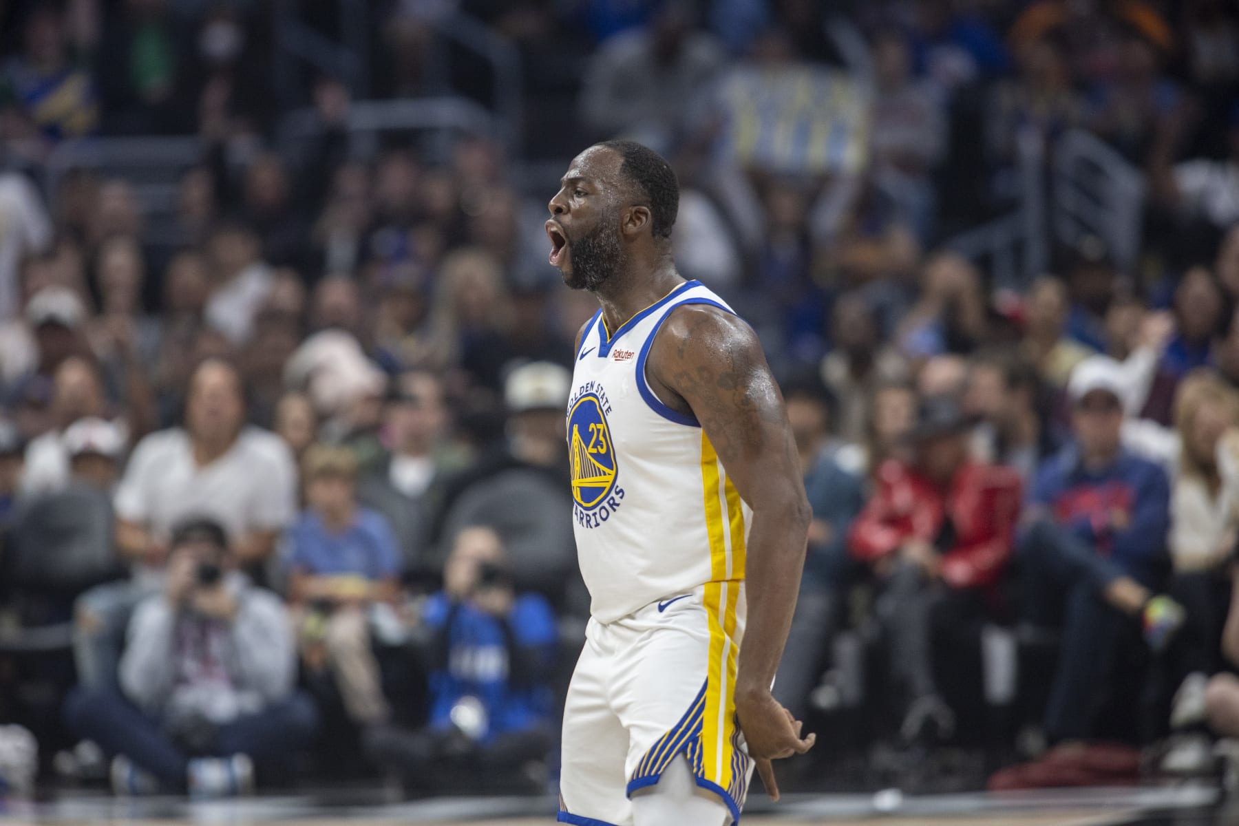 LOS ANGELES, CA - DECEMBER 02: Golden State Warriors forward Draymond Green (23) celebrates a basket in the first half of an NBA basketball game between the Golden State Warriors and Los Angeles Clippers, Saturday, December 2, 2023, at Crypto.com Arena in Los Angeles, California. (Photo by Tony Ding/Icon Sportswire via Getty Images)