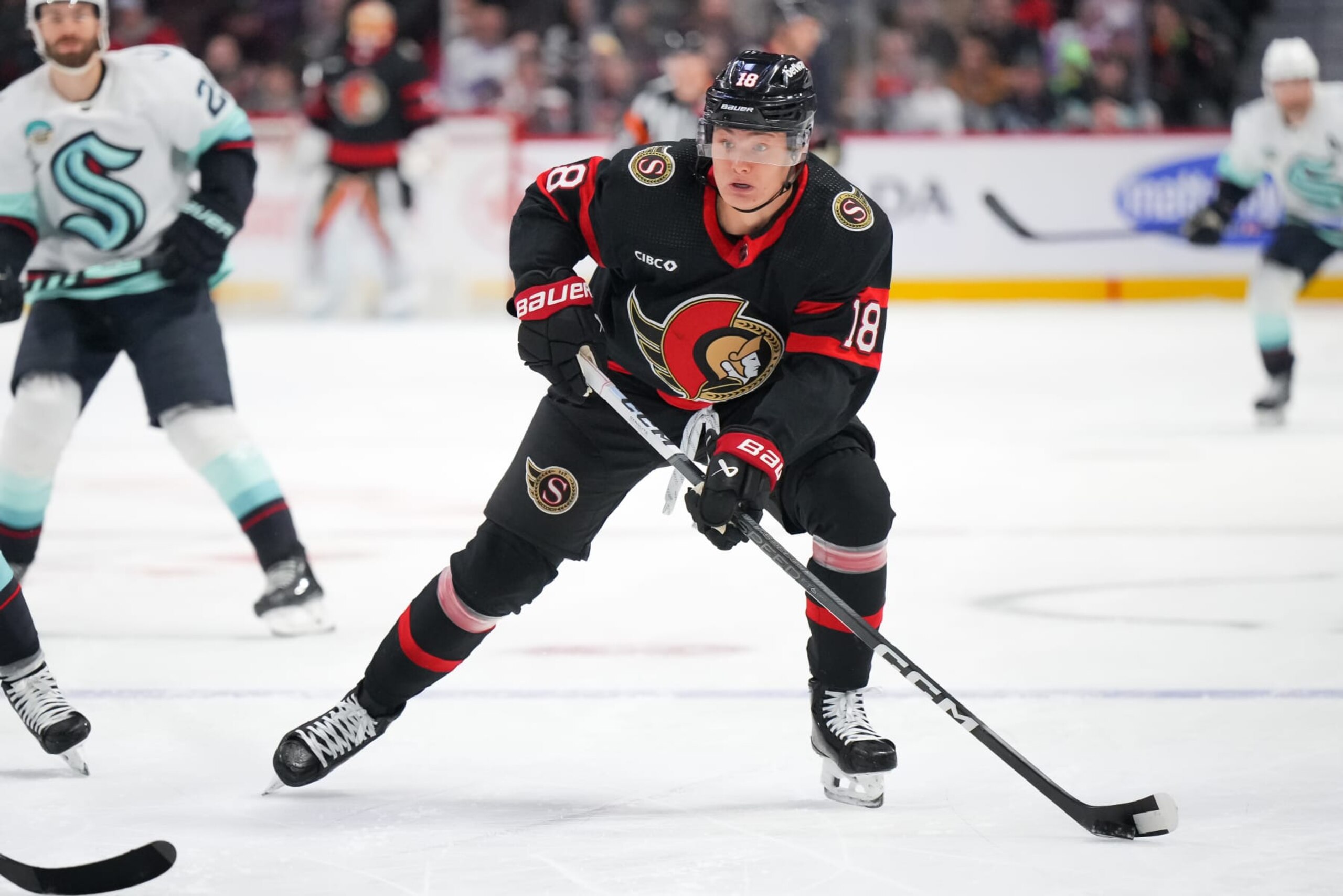 OTTAWA, CANADA - DECEMBER 2: Tim Stützle #18 of the Ottawa Senators skates against the Seattle Kraken at Canadian Tire Centre on December 2, 2023 in Ottawa, Ontario, Canada. (Photo by André Ringuette/NHLI via Getty Images) OTTAWA, CANADA - DECEMBER 2: Tim Stützle #18 of the Ottawa Senators skates against the Seattle Kraken at Canadian Tire Centre on December 2, 2023 in Ottawa, Ontario, Canada. (Photo by André Ringuette/NHLI via Getty Images)