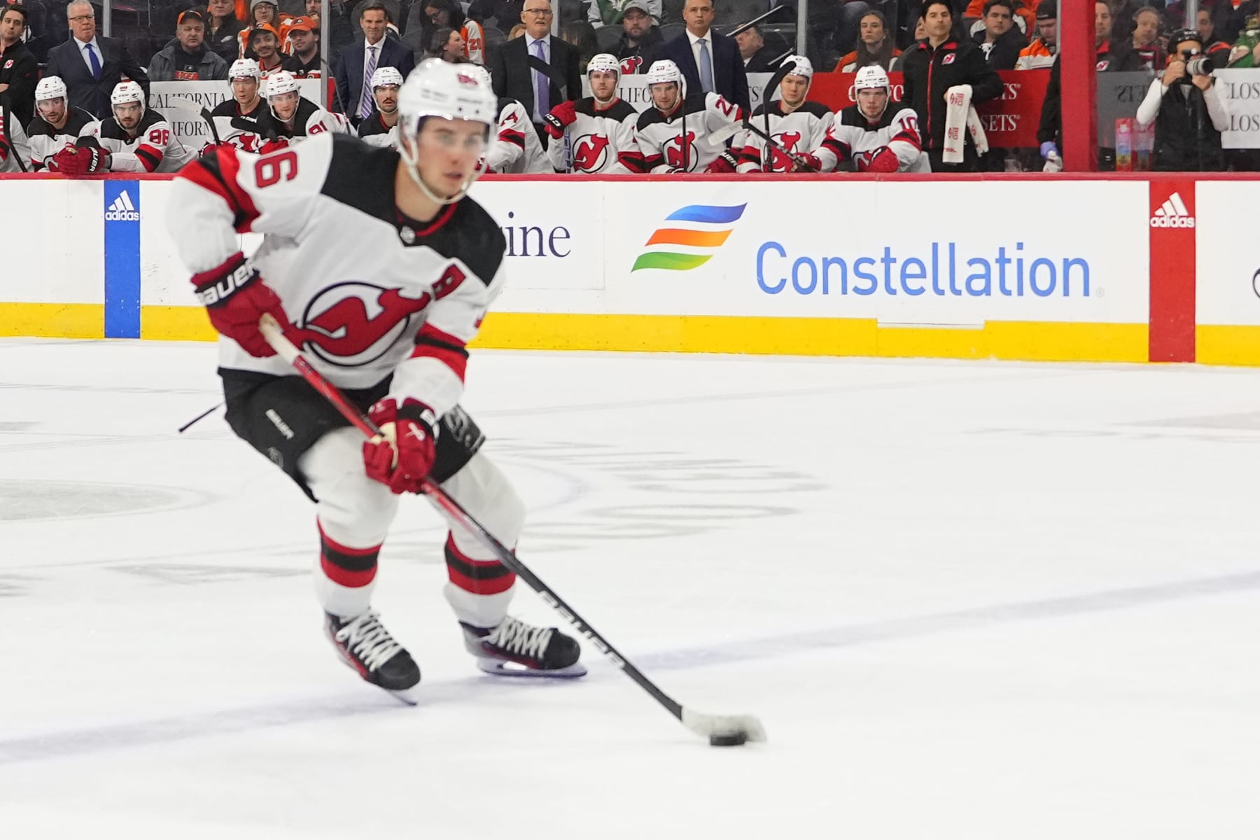 PHILADELPHIA, PA - NOVEMBER 30: New Jersey Devils Center Jack Hughes (86) skates with the puck during the first period of the National Hockey League game between the New Jersey Devils and the Philadelphia Flyers on November 30, 2023. At the Wells Fargo Center in Philadelphia, PA. (Photo by Gregory Fisher/Icon Sportswire via Getty Images)