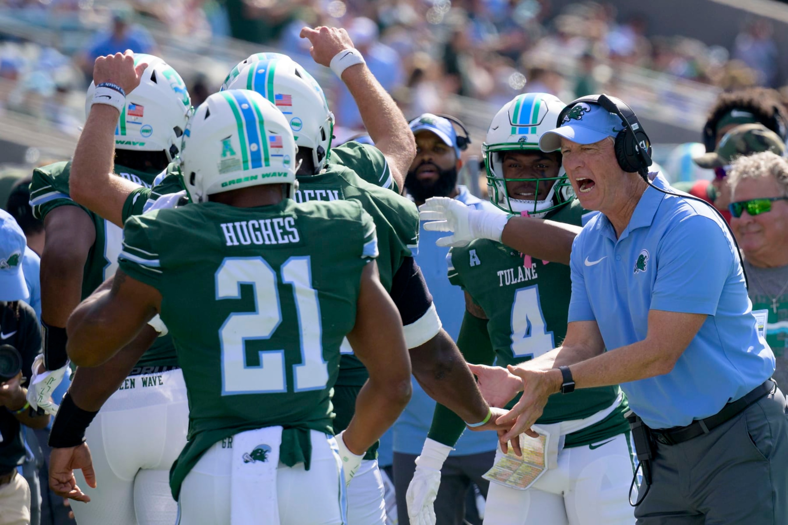 Tulane head coach Willie Fritz congratulates his team after a score against North Texas during the first half an NCAA football game on Saturday, Oct. 21, 2023, in New Orleans. (AP Photo/Matthew Hinton)