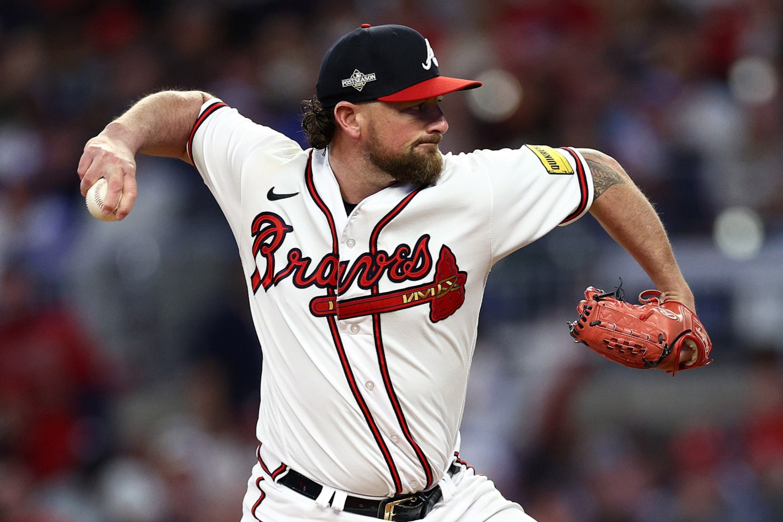 ATLANTA, GEORGIA - OCTOBER 09: Kirby Yates #22 of the Atlanta Braves pitches in the fifth inning against the Philadelphia Phillies during Game Two of the Division Series at Truist Park on October 09, 2023 in Atlanta, Georgia. (Photo by Elsa/Getty Images) ATLANTA, GEORGIA - OCTOBER 09: Kirby Yates #22 of the Atlanta Braves pitches in the fifth inning against the Philadelphia Phillies during Game Two of the Division Series at Truist Park on October 09, 2023 in Atlanta, Georgia. (Photo by Elsa/Getty Images)