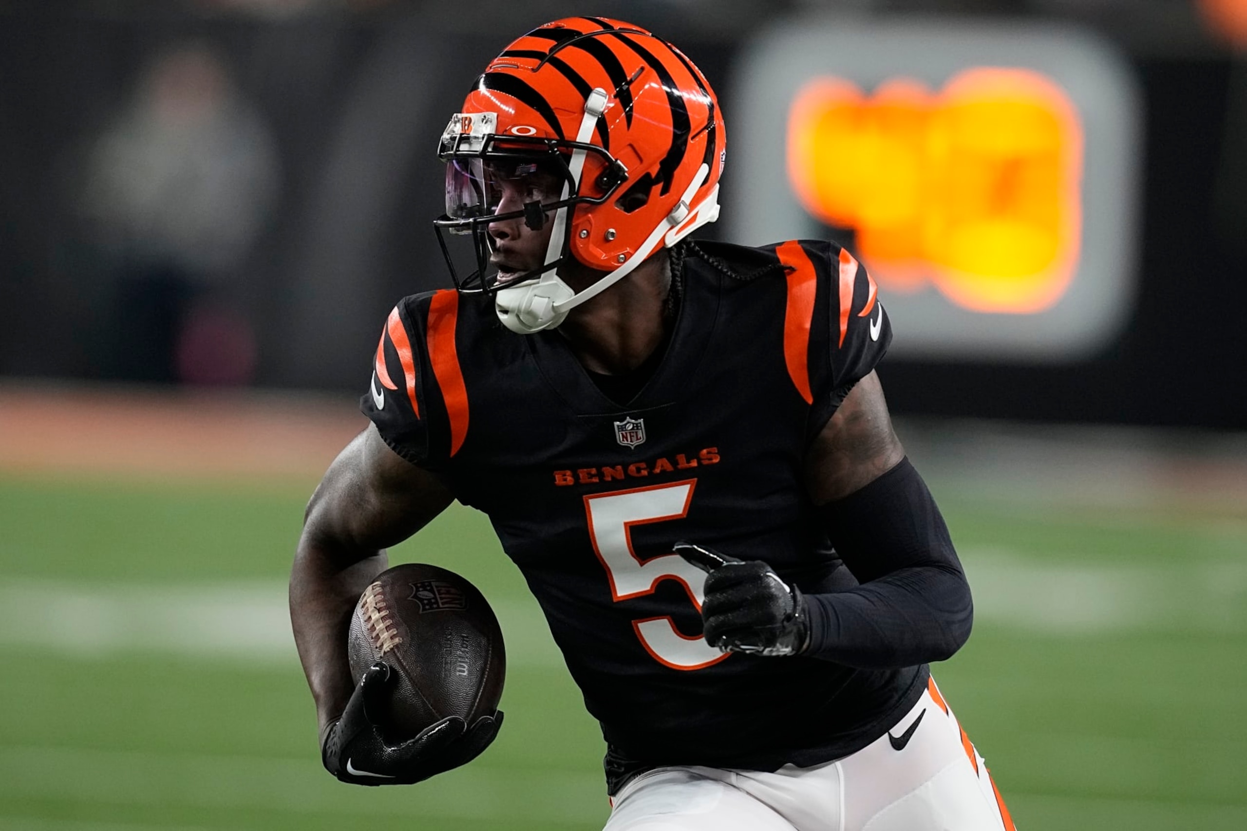 Cincinnati Bengals' Tee Higgins runs during the first half of an NFL football game against the Buffalo Bills, Sunday, Nov. 5, 2023, in Cincinnati. (AP Photo/Darron Cummings) Cincinnati Bengals' Tee Higgins runs during the first half of an NFL football game against the Buffalo Bills, Sunday, Nov. 5, 2023, in Cincinnati. (AP Photo/Darron Cummings)