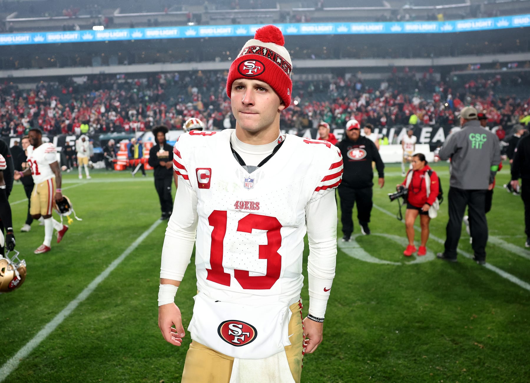 PHILADELPHIA, PENNSYLVANIA - DECEMBER 03: Brock Purdy #13 of the San Francisco 49ers walks on the field after a win over the Philadelphia Eagles at Lincoln Financial Field on December 03, 2023 in Philadelphia, Pennsylvania. (Photo by Tim Nwachukwu/Getty Images)