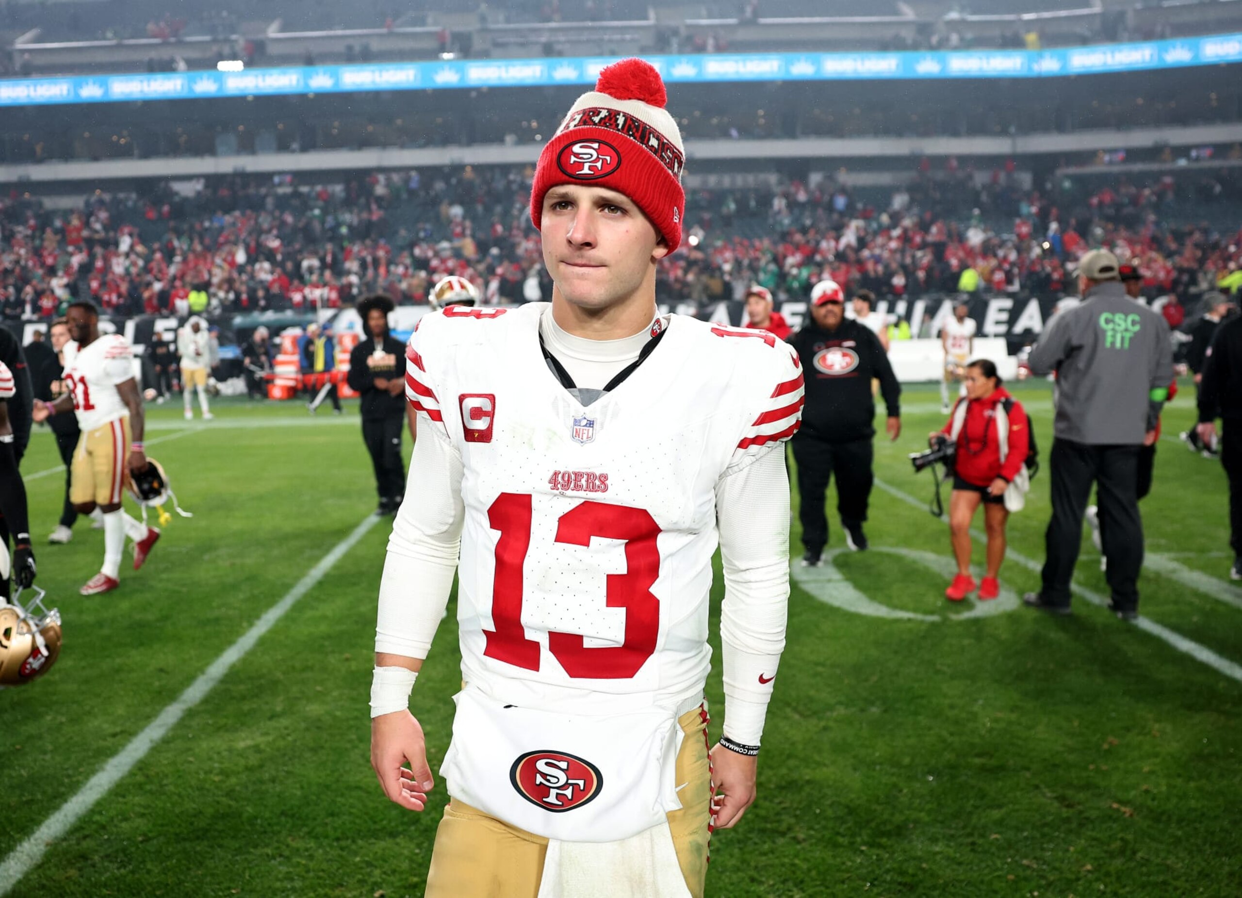 PHILADELPHIA, PENNSYLVANIA - DECEMBER 03: Brock Purdy #13 of the San Francisco 49ers walks on the field after a win over the Philadelphia Eagles at Lincoln Financial Field on December 03, 2023 in Philadelphia, Pennsylvania. (Photo by Tim Nwachukwu/Getty Images)