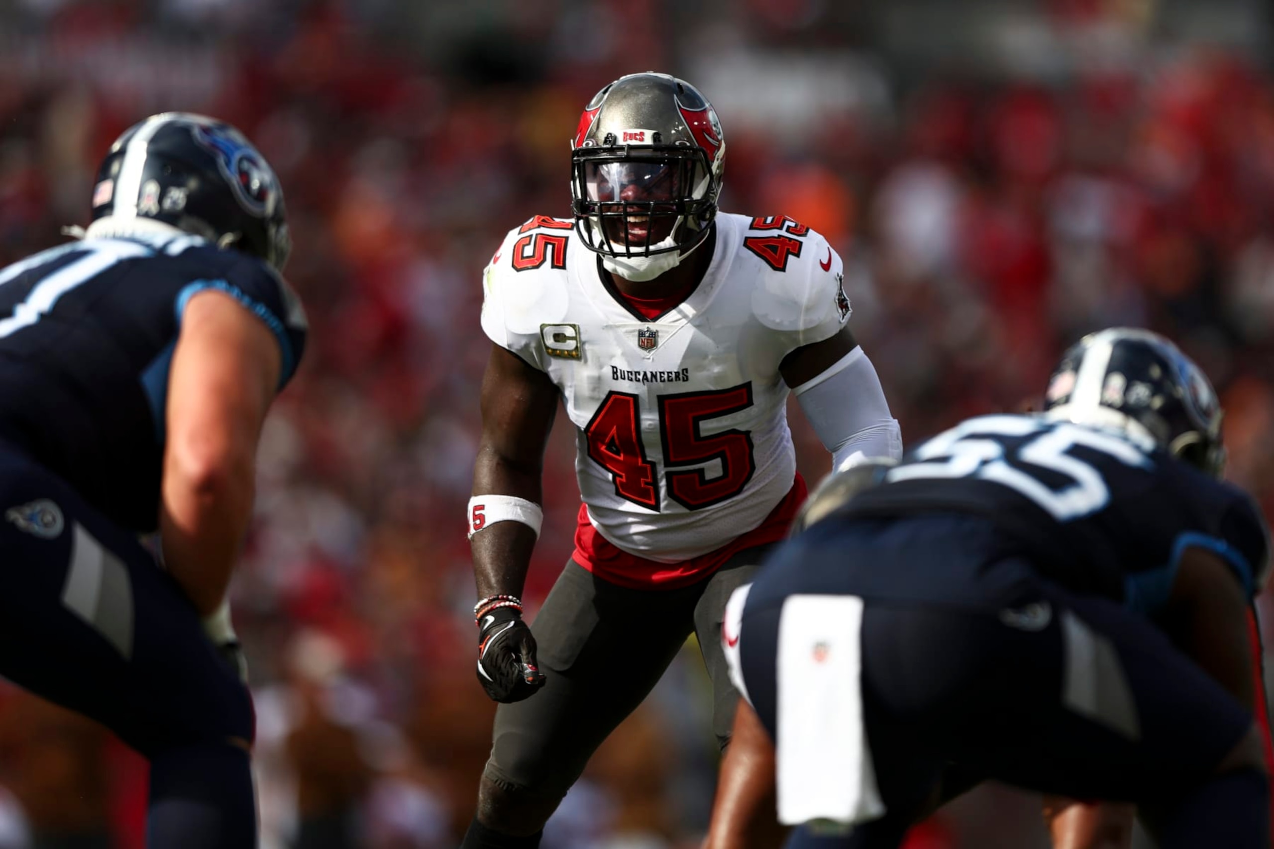 TAMPA, FL - NOVEMBER 12: Devin White #45 of the Tampa Bay Buccaneers lines up before a play during the second quarter of an NFL football game against the Tennessee Titans at Raymond James Stadium on November 12, 2023 in Tampa, Florida. (Photo by Kevin Sabitus/Getty Images) TAMPA, FL - NOVEMBER 12: Devin White #45 of the Tampa Bay Buccaneers lines up before a play during the second quarter of an NFL football game against the Tennessee Titans at Raymond James Stadium on November 12, 2023 in Tampa, Florida. (Photo by Kevin Sabitus/Getty Images)
