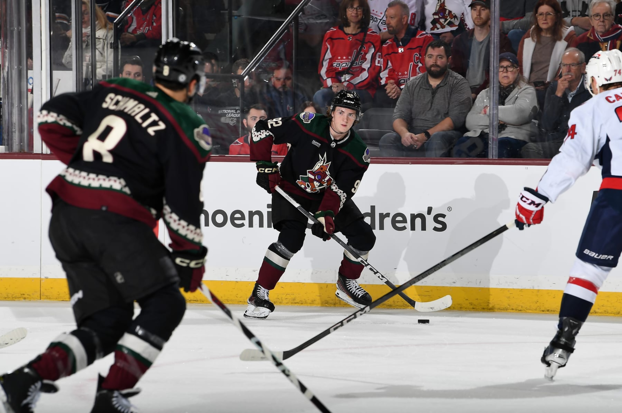 TEMPE, ARIZONA - DECEMBER 04: Logan Cooley #92 of the Arizona Coyotes skates with the puck against the Washington Capitals at Mullett Arena on December 04, 2023 in Tempe, Arizona. (Photo by Norm Hall/NHLI via Getty Images)