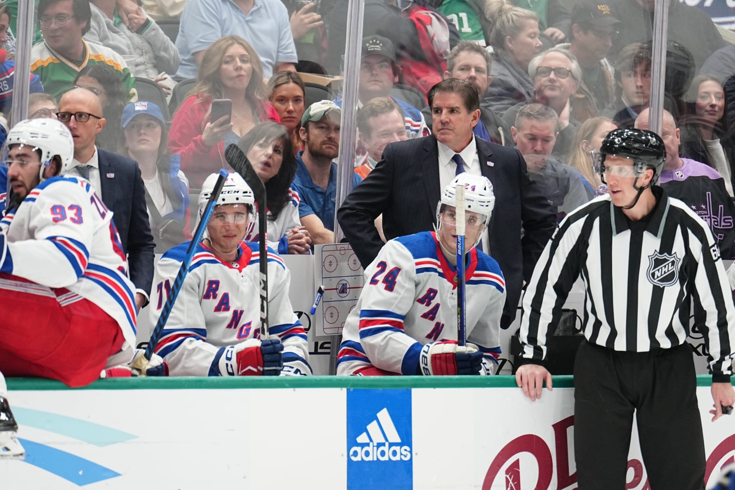 DALLAS, TX - NOVEMBER 20: Peter Laviolette of the New York Rangers watches the action from behind the bench against the Dallas Stars at the American Airlines Center on November 20, 2023 in Dallas, Texas. (Photo by Glenn James/NHLI via Getty Images)