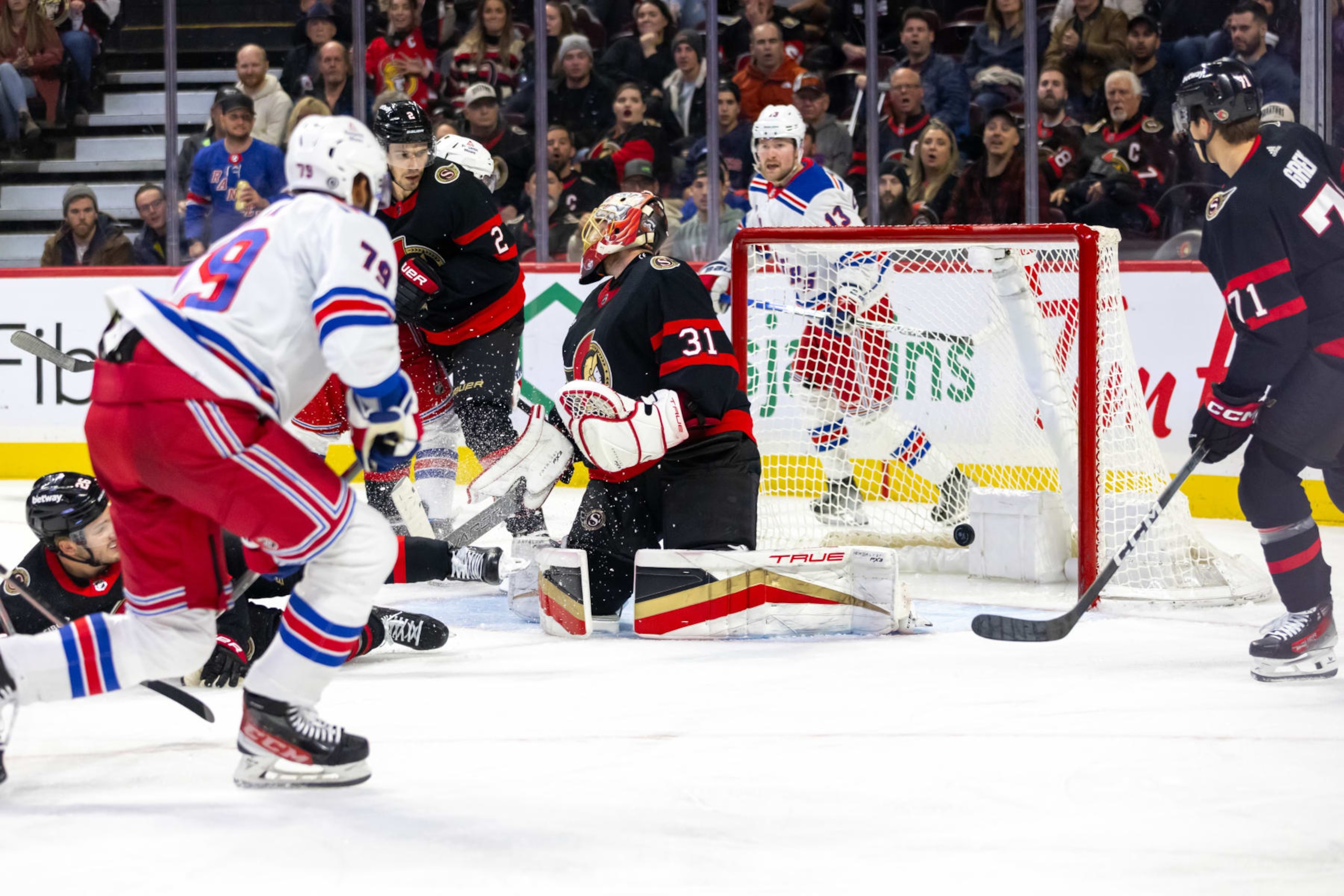 OTTAWA, ON - DECEMBER 05: Ottawa Senators Goalie Anton Forsberg (31) allows a goal by New York Rangers Defenceman K'Andre Miller (79) during second period National Hockey League action between the New York Rangers and Ottawa Senators on December 5, 2023, at Canadian Tire Centre in Ottawa, ON, Canada. (Photo by Richard A. Whittaker/Icon Sportswire via Getty Images)