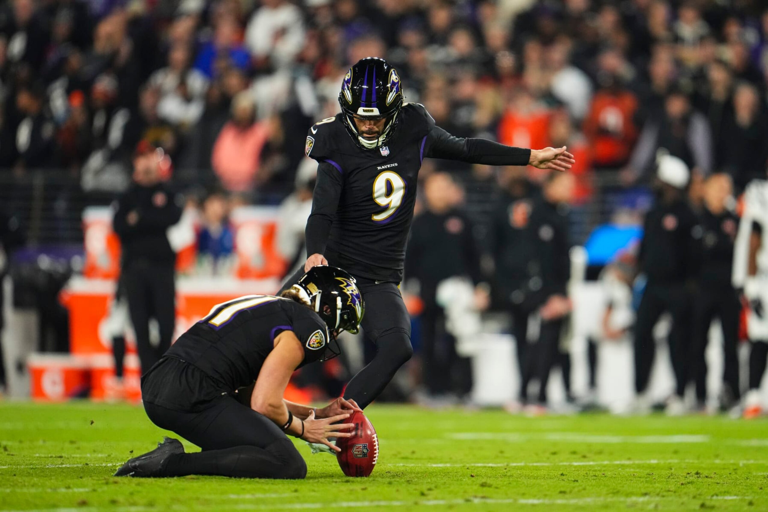 BALTIMORE, MD - NOVEMBER 16: Justin Tucker #9 of the Baltimore Ravens kicks for a field goal during an NFL football game against the Cincinnati Bengals at M&T Bank Stadium on November 16, 2023 in Baltimore, Maryland. (Photo by Cooper Neill/Getty Images)