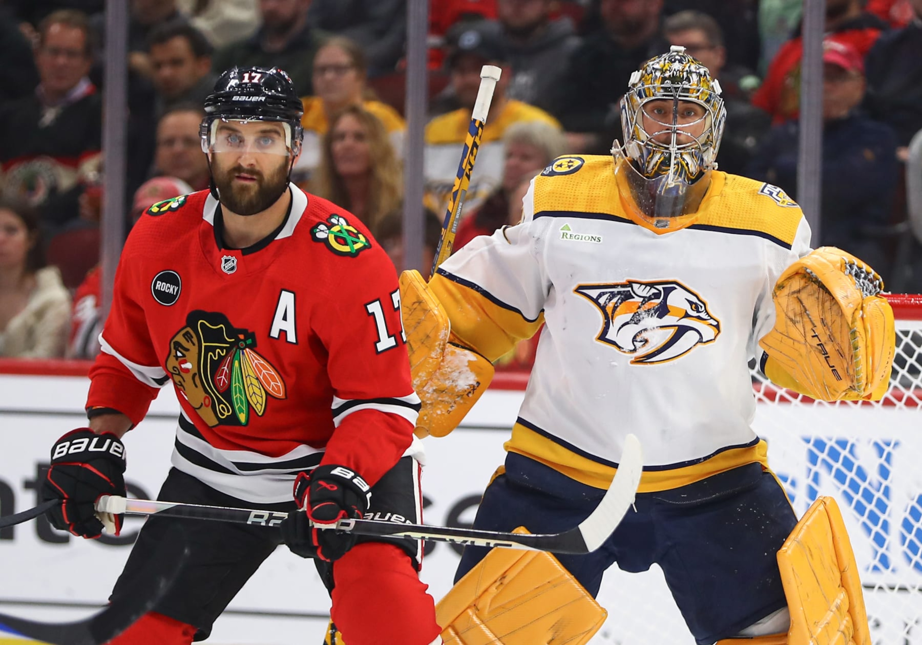 CHICAGO, IL - DECEMBER 05: Nick Foligno #17 of the Chicago Blackhawks stands in front of Juuse Saros #74 of the Nashville Predators during the first period at the United Center on December 5, 2023 in Chicago, Illinois. (Photo by Melissa Tamez/Icon Sportswire via Getty Images) CHICAGO, IL - DECEMBER 05: Nick Foligno #17 of the Chicago Blackhawks stands in front of Juuse Saros #74 of the Nashville Predators during the first period at the United Center on December 5, 2023 in Chicago, Illinois. (Photo by Melissa Tamez/Icon Sportswire via Getty Images)