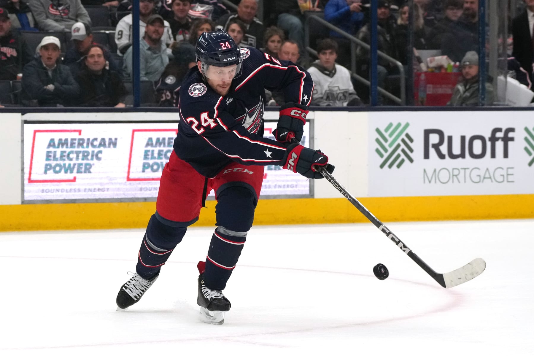 COLUMBUS, OHIO - DECEMBER 05: Mathieu Olivier #24 of the Columbus Blue Jackets controls the puck during the second period against the Los Angeles Kings at Nationwide Arena on December 05, 2023 in Columbus, Ohio. (Photo by Jason Mowry/Getty Images)