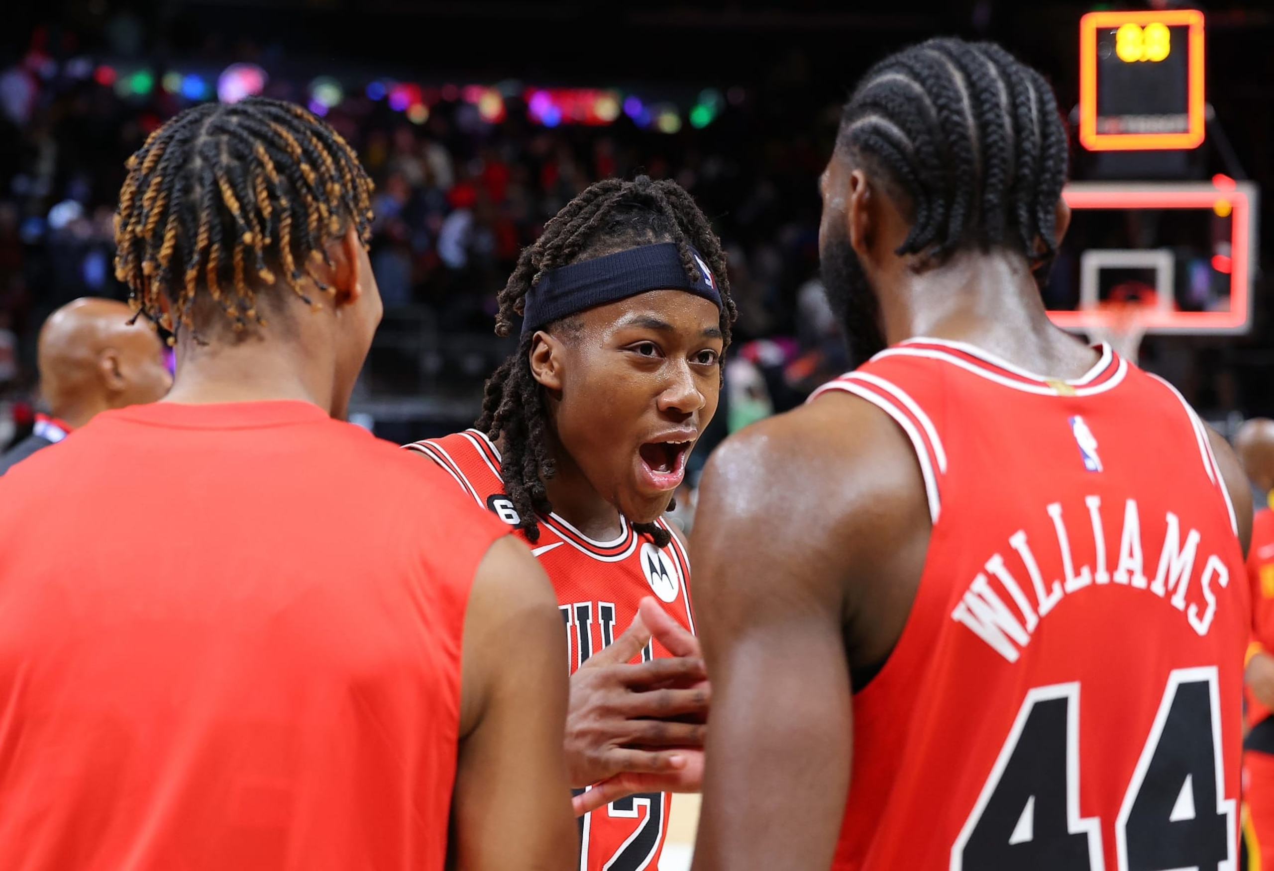 ATLANTA, GEORGIA - DECEMBER 21: Ayo Dosunmu #12 of the Chicago Bulls reacts with Dalen Terry #25 and Patrick Williams #44 after hitting the game-winning basket as time expired in their 110-108 win over the Atlanta Hawks at State Farm Arena on December 21, 2022 in Atlanta, Georgia. NOTE TO USER: User expressly acknowledges and agrees that, by downloading and or using this photograph, User is consenting to the terms and conditions of the Getty Images License Agreement. (Photo by Kevin C. Cox/Getty Images) ATLANTA, GEORGIA - DECEMBER 21: Ayo Dosunmu #12 of the Chicago Bulls reacts with Dalen Terry #25 and Patrick Williams #44 after hitting the game-winning basket as time expired in their 110-108 win over the Atlanta Hawks at State Farm Arena on December 21, 2022 in Atlanta, Georgia. NOTE TO USER: User expressly acknowledges and agrees that, by downloading and or using this photograph, User is consenting to the terms and conditions of the Getty Images License Agreement. (Photo by Kevin C. Cox/Getty Images)