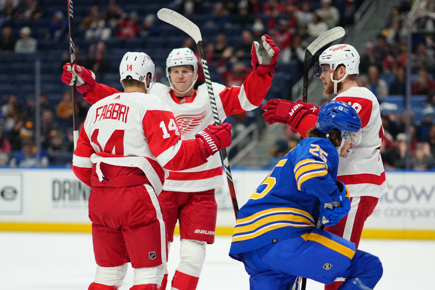 BUFFALO, NEW YORK - DECEMBER 5: Robby Fabbri #14 of the Detroit Red Wings celebrates his first period goal with teammates during an NHL game against the Buffalo Sabres on December 5, 2023 at KeyBank Center in Buffalo, New York. (Photo by Ben Ludeman/NHLI via Getty Images)