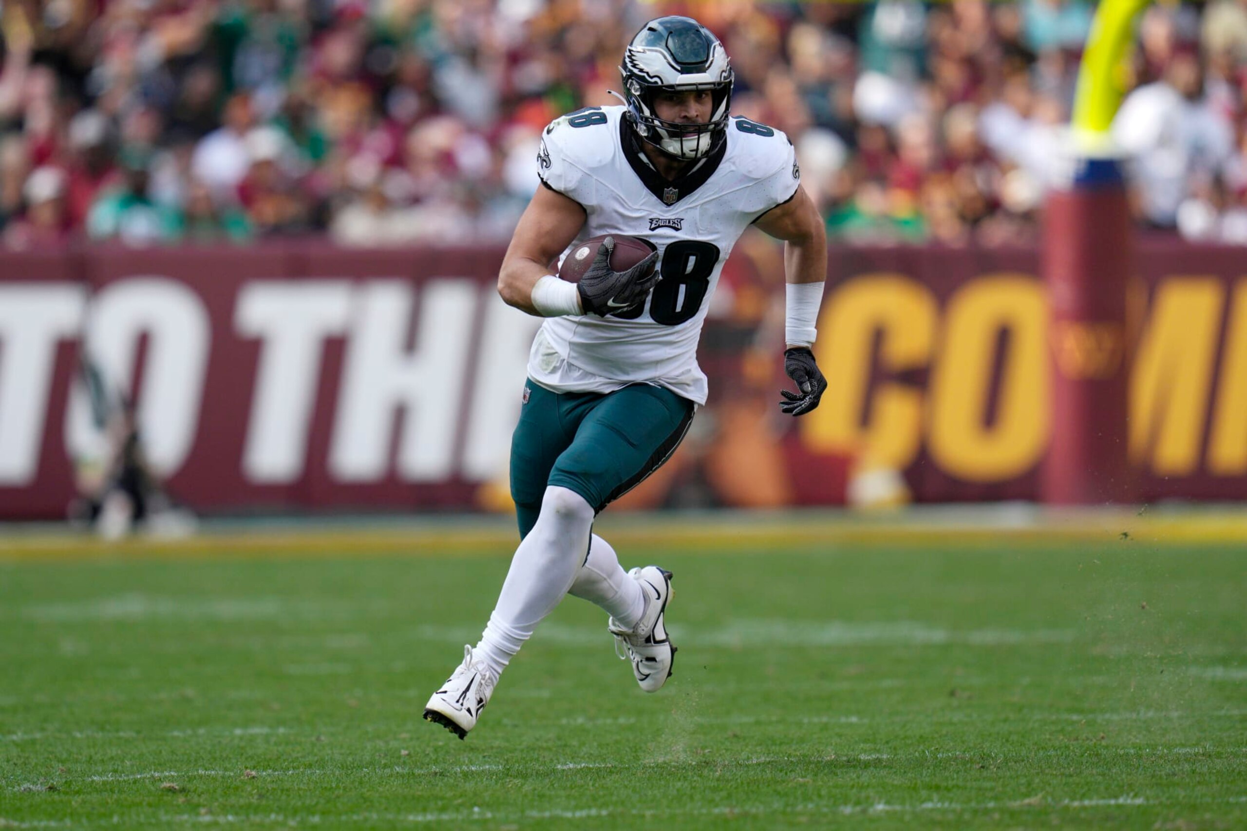 LANDOVER, MARYLAND - OCTOBER 29: Dallas Goedert #88 of the Philadelphia Eagles runs with the ball against the Washington Commanders during the fourth quarter at FedExField on October 29, 2023 in Landover, Maryland. (Photo by Jess Rapfogel/Getty Images)