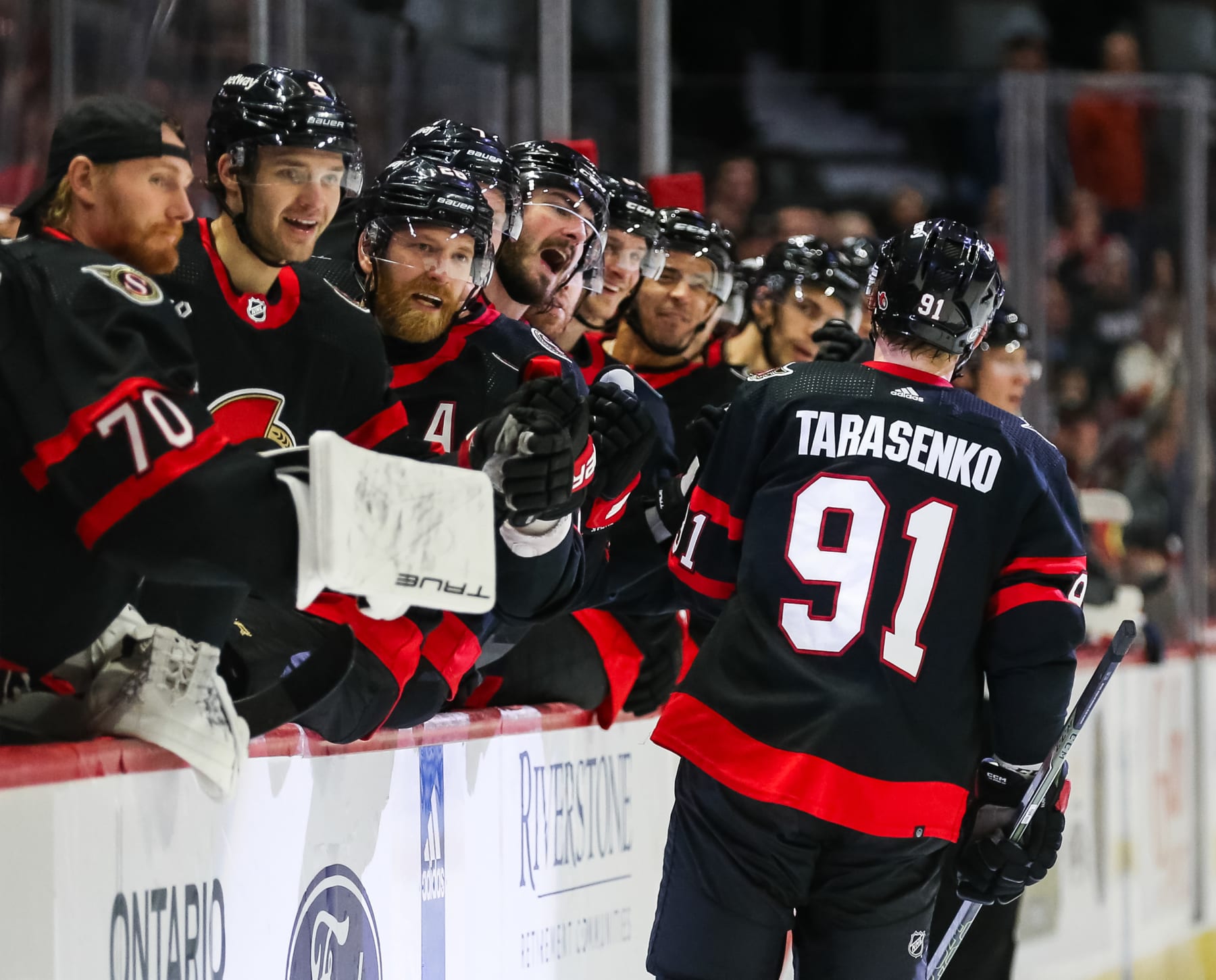 OTTAWA, CANADA - DECEMBER 05: Vladimir Tarasenko #91 of the Ottawa Senators celebrates his second period goal against the New York Rangers with his teammates on the bench at Canadian Tire Centre on December 05, 2023 in Ottawa, Ontario, Canada. (Photo by Chris Tanouye/Freestyle Photography/Getty Images)
