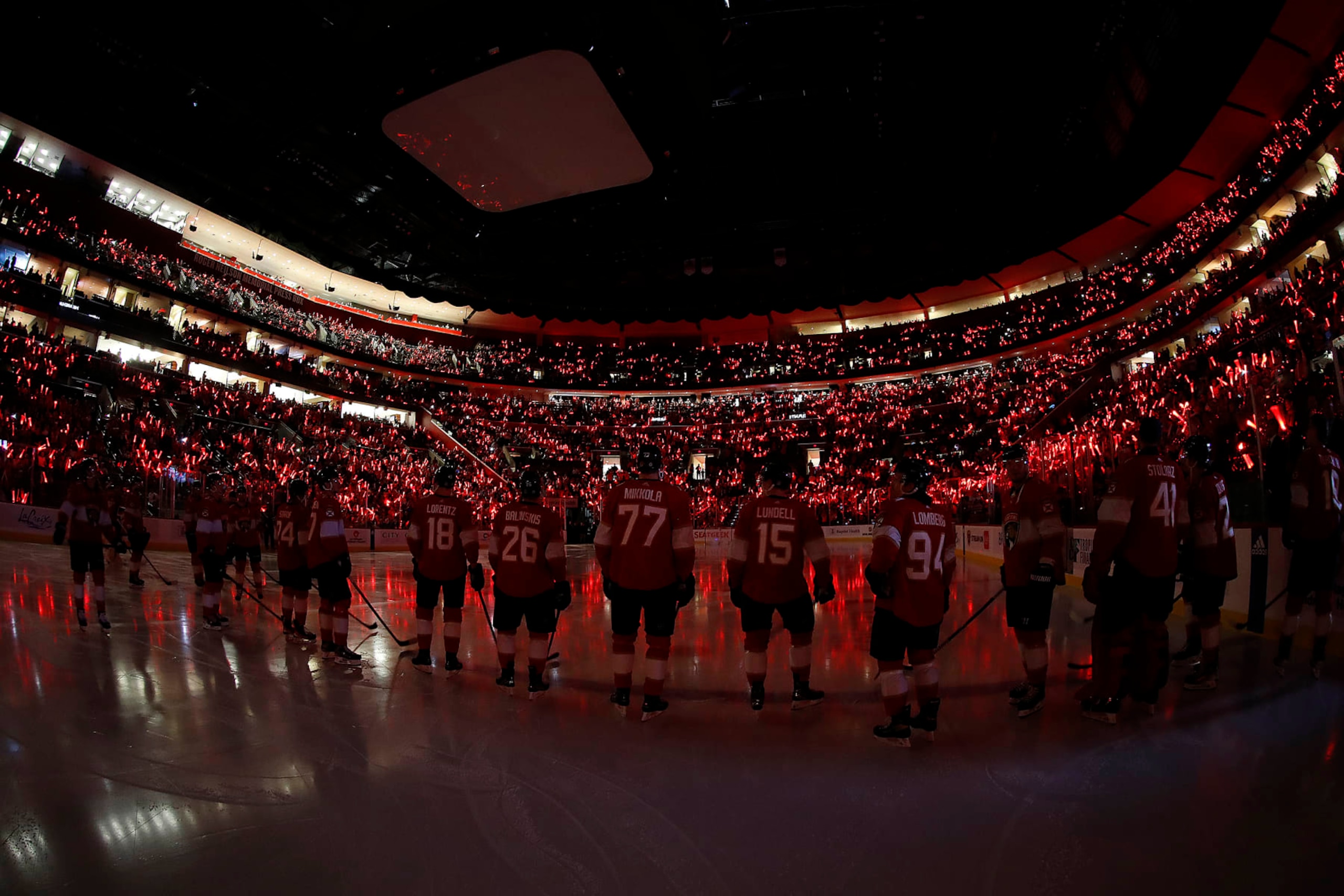 SUNRISE, FLORIDA - OCTOBER 19: The Florida Panthers stand on the ice to the cheers from the home crowd prior to the start of the game against the Toronto Maple Leafs at the Amerant Bank Arena on October 19, 2023 in Sunrise, Florida. (Photo by Eliot J. Schechter/NHLI via Getty Images)