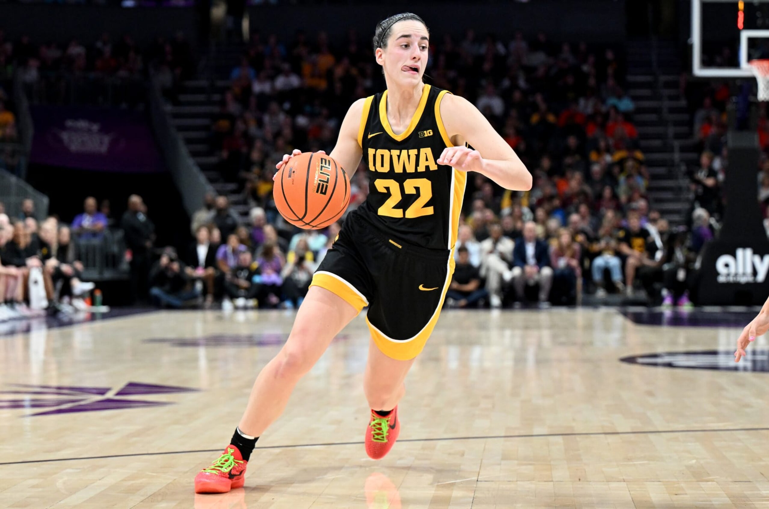 CHARLOTTE, NORTH CAROLINA - NOVEMBER 09: Caitlin Clark #22 of the Iowa Hawkeyes handles the ball against the Virginia Tech Hokies at Spectrum Center on November 09, 2023 in Charlotte, North Carolina. (Photo by G Fiume/Getty Images) CHARLOTTE, NORTH CAROLINA - NOVEMBER 09: Caitlin Clark #22 of the Iowa Hawkeyes handles the ball against the Virginia Tech Hokies at Spectrum Center on November 09, 2023 in Charlotte, North Carolina. (Photo by G Fiume/Getty Images)