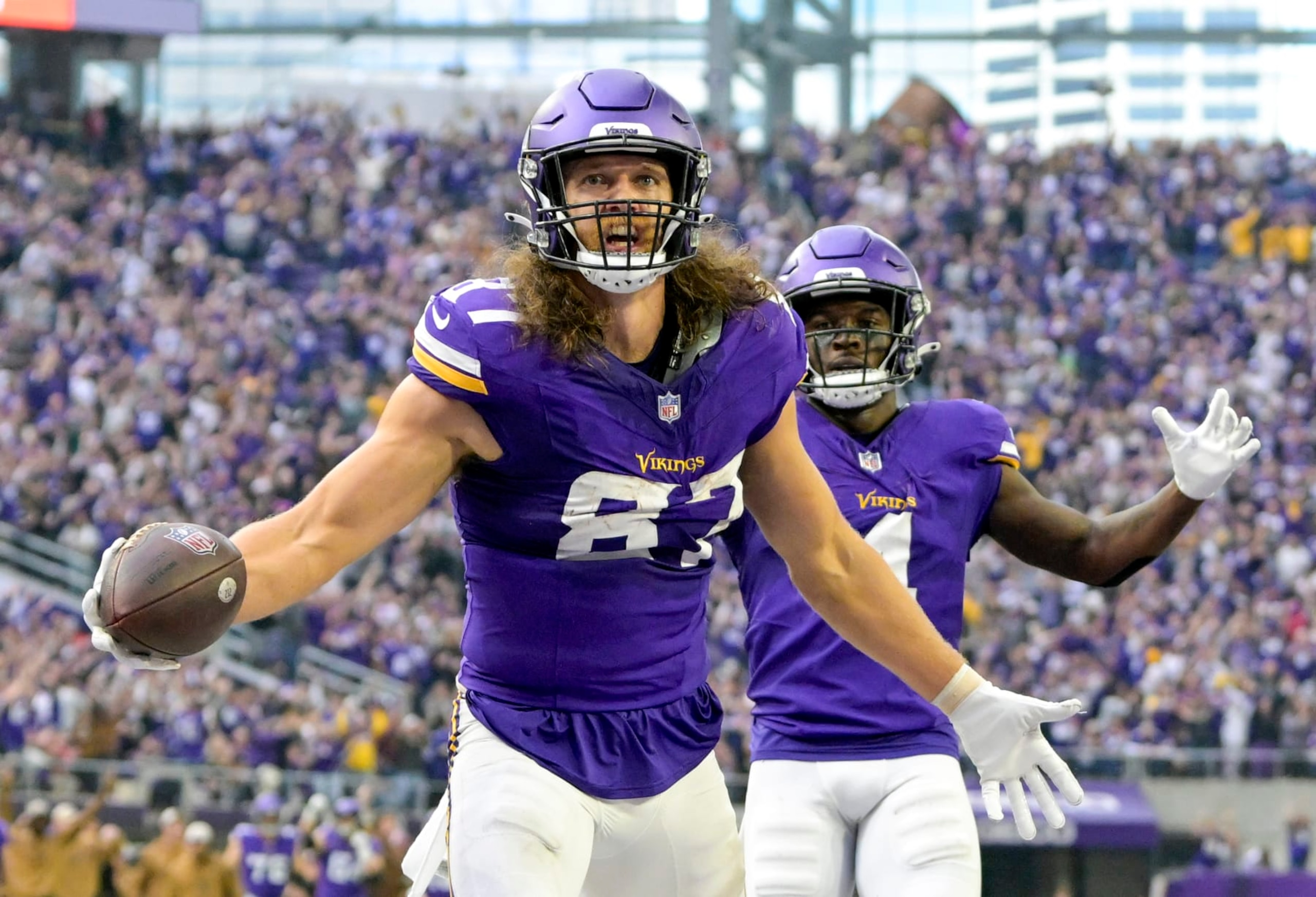 MINNEAPOLIS, MN - NOVEMBER 12: Minnesota Vikings tight end T.J. Hockenson (87) celebrates his 28-yard touchdown reception during the second quarter of an NFL game between the Minnesota Vikings and New Orleans Saints on November 12, 2023, at U.S. Bank Stadium in Minneapolis, MN. (Photo by Nick Wosika/Icon Sportswire via Getty Images)