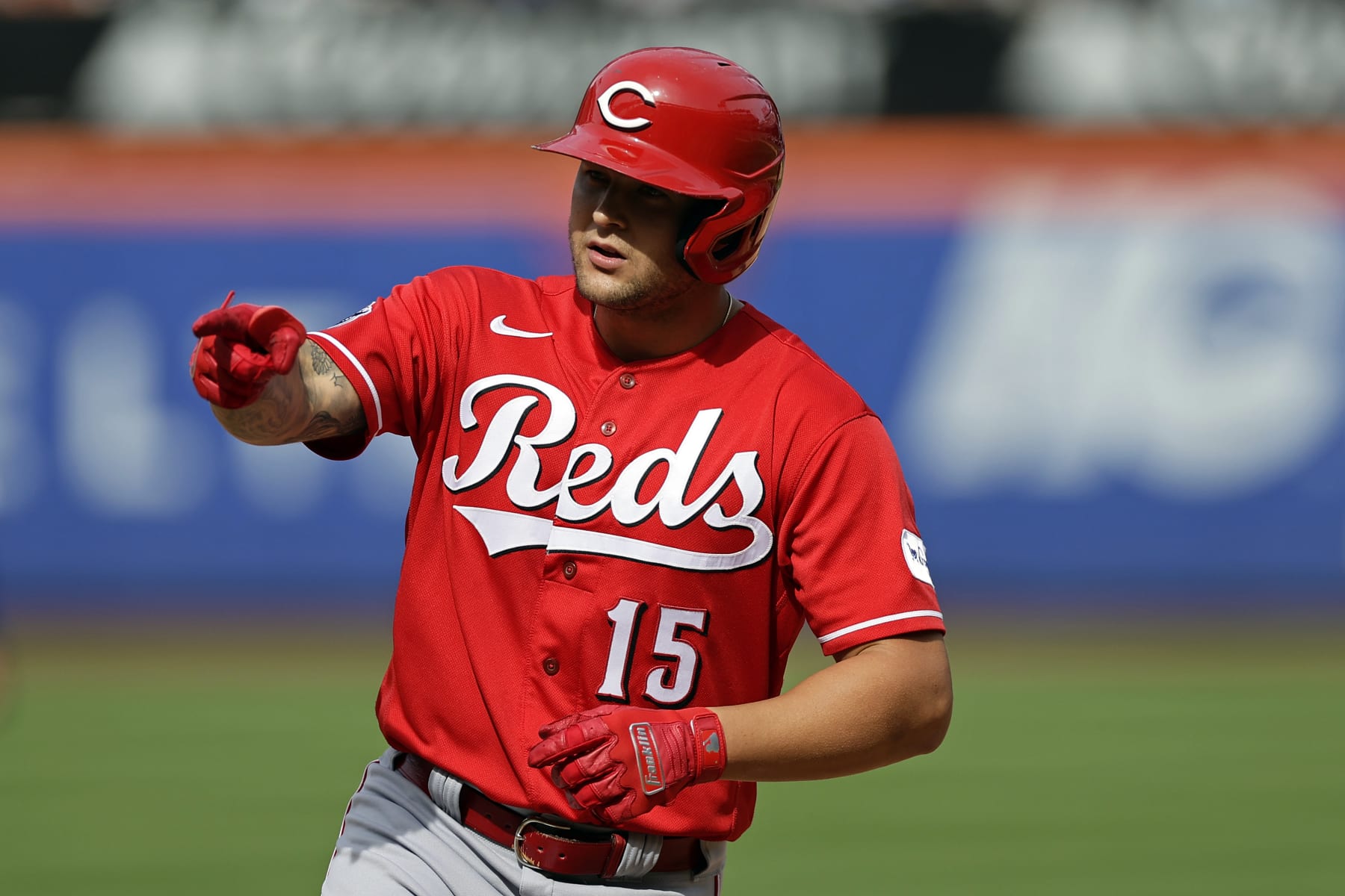 NEW YORK, NY - SEPTEMBER 17: Nick Senzel #15 of the Cincinnati Reds reacts after hitting a home run against the New York Mets during the fifth inning at Citi Field on September 17, 2023 in New York City. (Photo by Adam Hunger/Getty Images)
