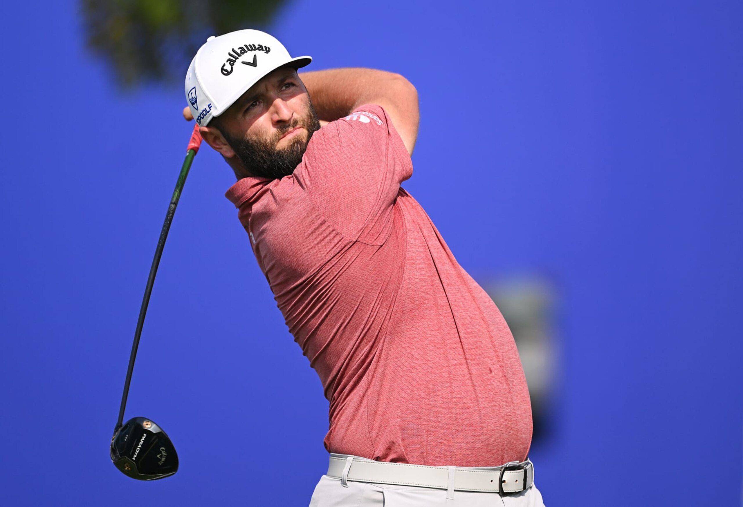 DUBAI, UNITED ARAB EMIRATES - NOVEMBER 19: Jon Rahm of Spain tees off on the 14th hole during Day Four of the DP World Tour Championship on the Earth Course at Jumeirah Golf Estates on November 19, 2023 in Dubai, United Arab Emirates. (Photo by Ross Kinnaird/Getty Images)