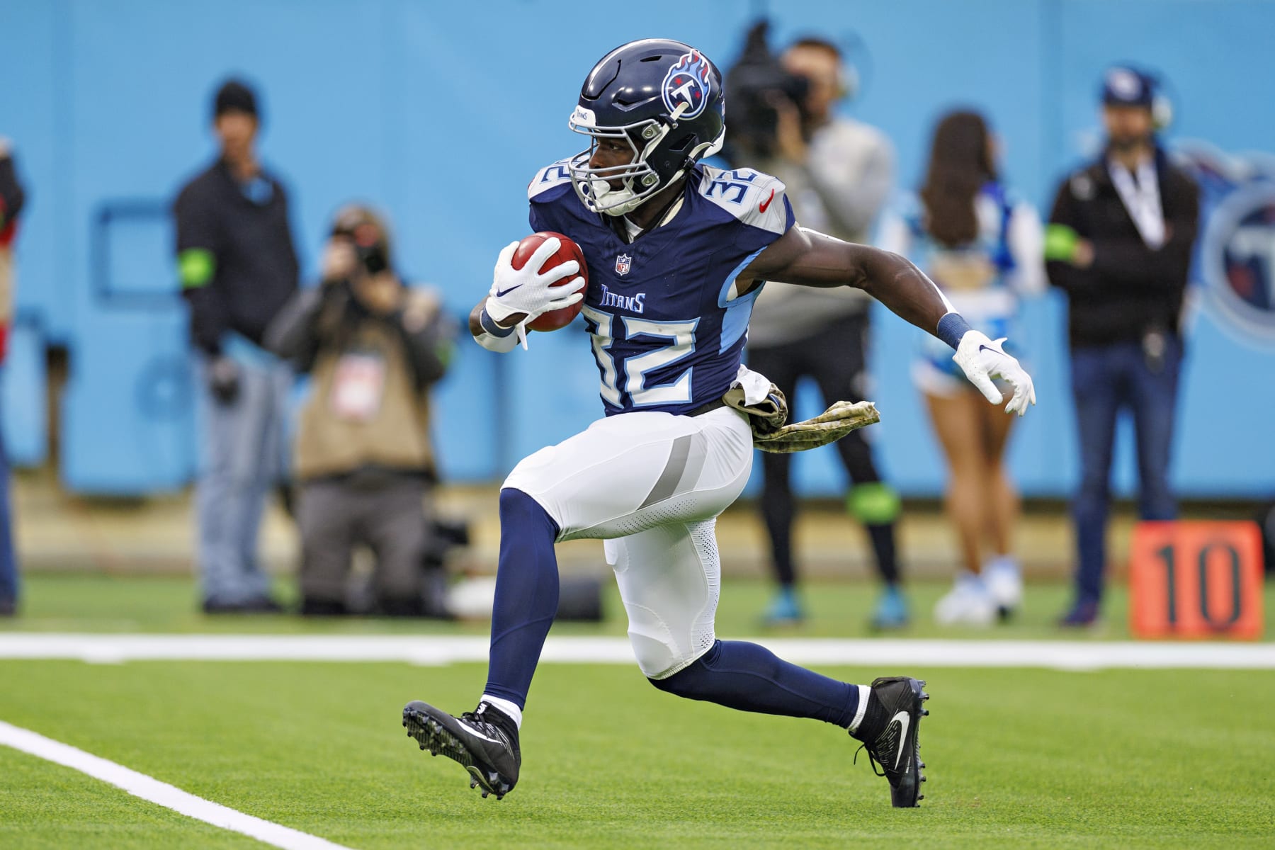 NASHVILLE, TENNESSEE - NOVEMBER 26: Tyjae Spears #32 of the Tennessee Titans runs the ball during the game against the Carolina Panthers at Nissan Stadium on November 26, 2023 in Nashville, Tennessee. The Titans defeated the Panthers 17-10.  (Photo by Wesley Hitt/Getty Images)