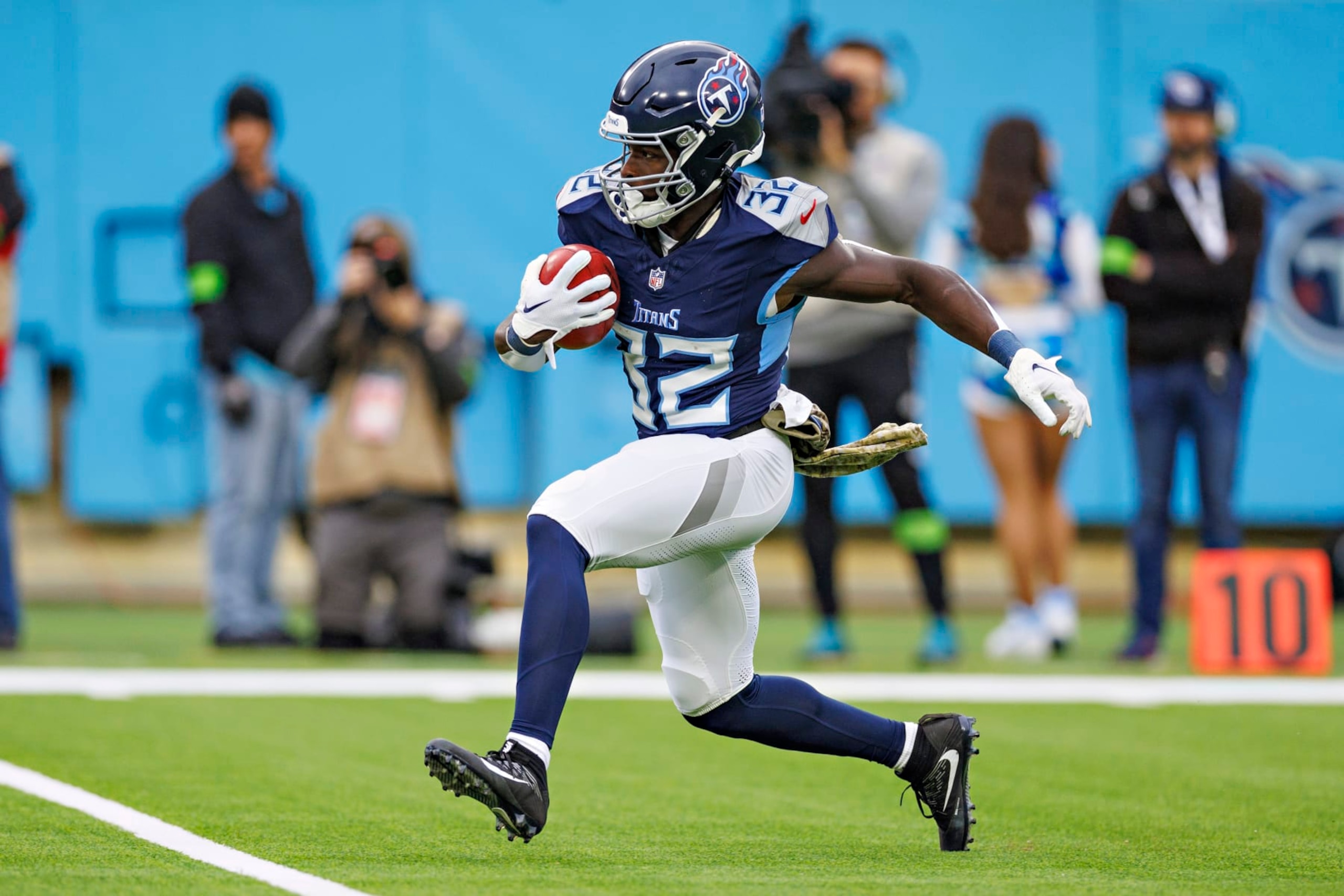 NASHVILLE, TENNESSEE - NOVEMBER 26: Tyjae Spears #32 of the Tennessee Titans runs the ball during the game against the Carolina Panthers at Nissan Stadium on November 26, 2023 in Nashville, Tennessee. The Titans defeated the Panthers 17-10. (Photo by Wesley Hitt/Getty Images) NASHVILLE, TENNESSEE - NOVEMBER 26: Tyjae Spears #32 of the Tennessee Titans runs the ball during the game against the Carolina Panthers at Nissan Stadium on November 26, 2023 in Nashville, Tennessee. The Titans defeated the Panthers 17-10. (Photo by Wesley Hitt/Getty Images)