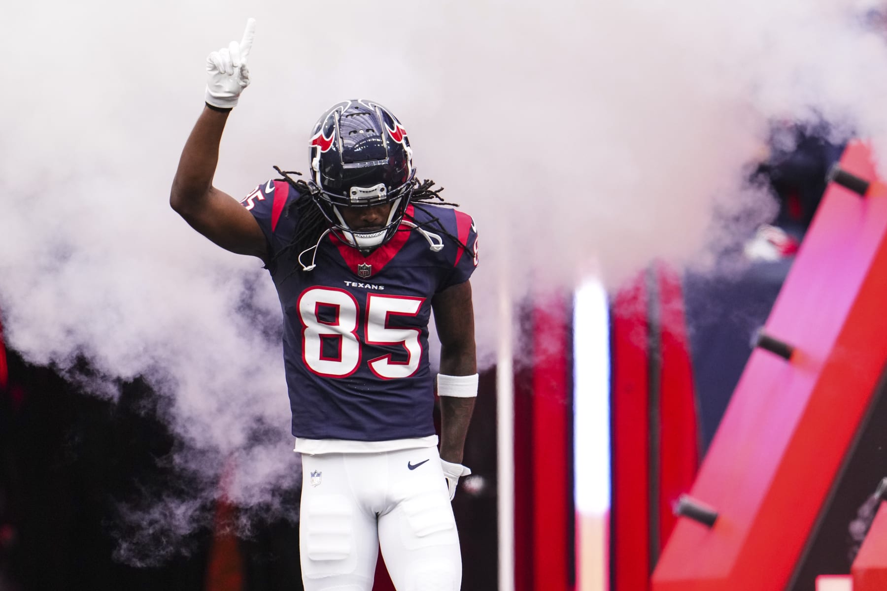 HOUSTON, TX - DECEMBER 03: Noah Brown #85 of the Houston Texans runs out of the tunnel prior to an NFL football game against the Denver Broncos at NRG Stadium on December 3, 2023 in Houston, Texas. (Photo by Cooper Neill/Getty Images)