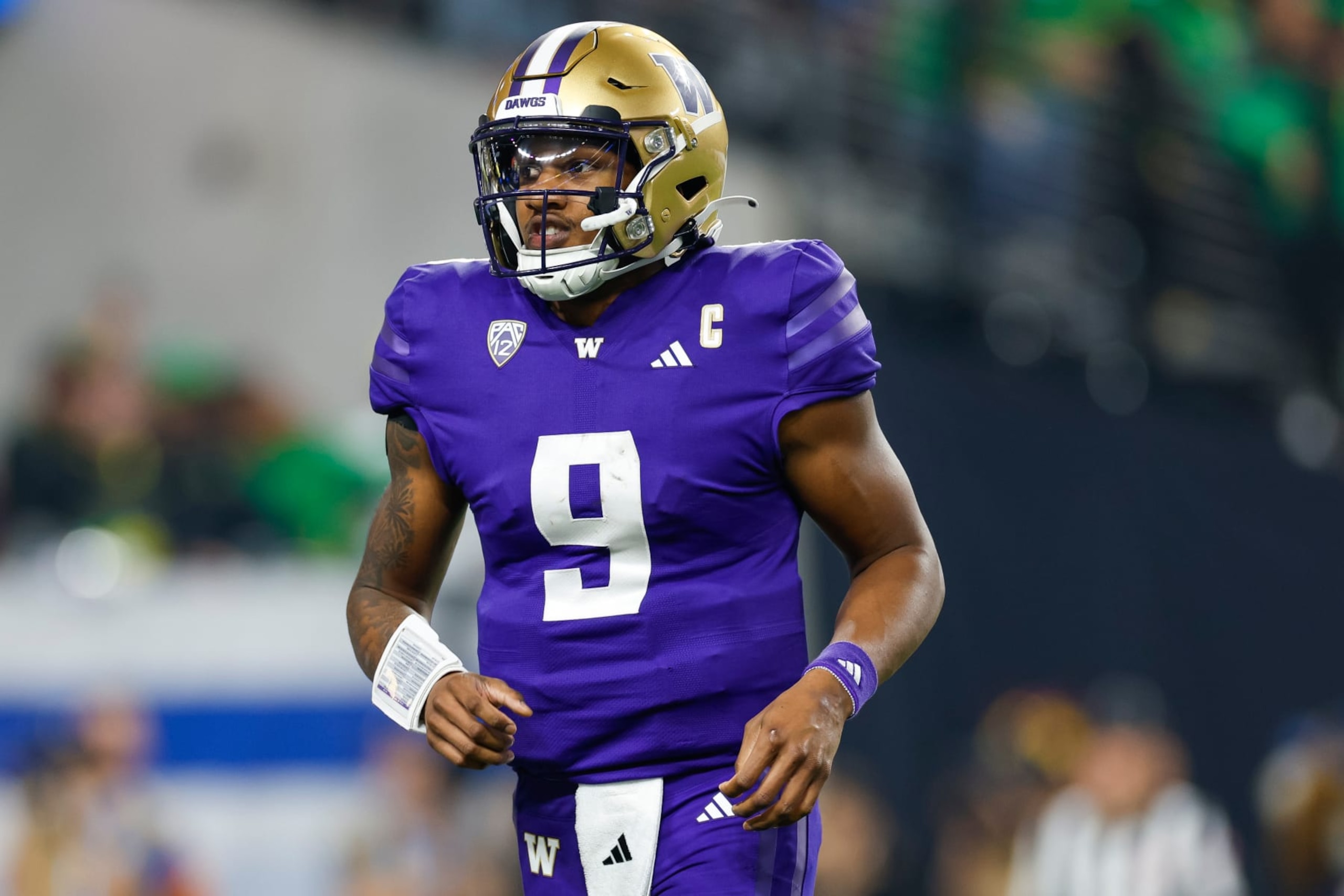 LAS VEGAS, NEVADA - DECEMBER 1: Michael Penix Jr. #9 of the Washington Huskies celebrates a touchdown  during the Pac-12 Championship game against the Oregon Ducks at Allegiant Stadium on December 1, 2023 in Las Vegas, Nevada. (Photo by Brandon Sloter/Image Of Sport/Getty Images)